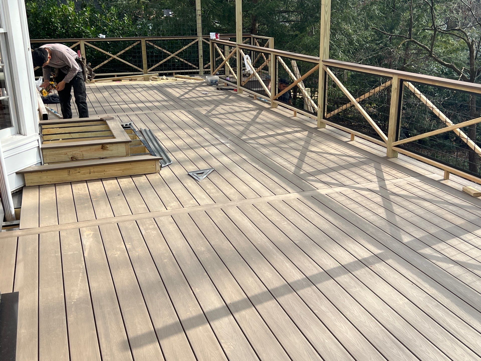 Deck Build and Screened-In Porch Install with Wild Hog 6' Black Mesh Panel Railing by Nelson Exteriors