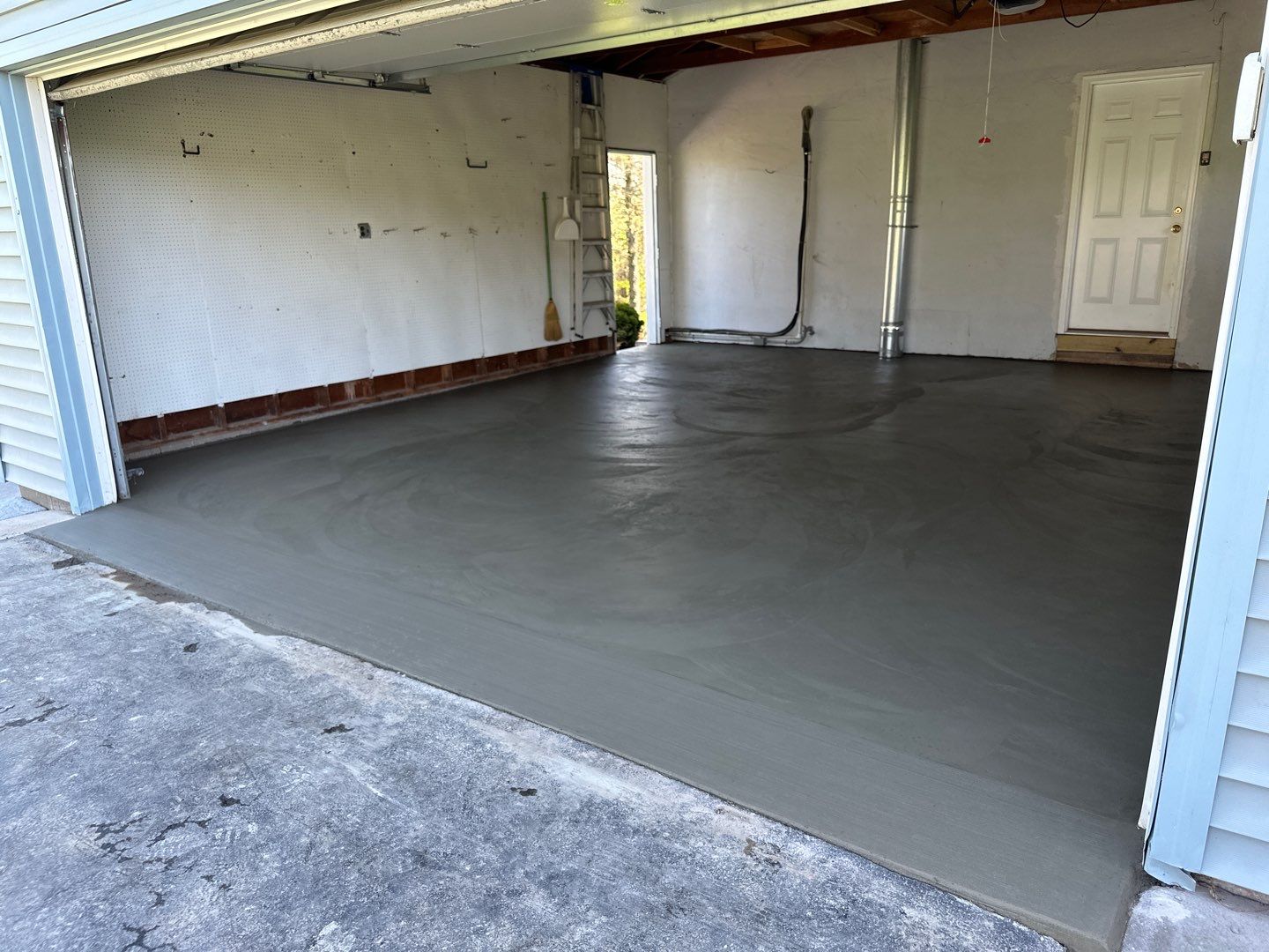 Concrete garage floor replacement  by NG Masonry & Construction LLC