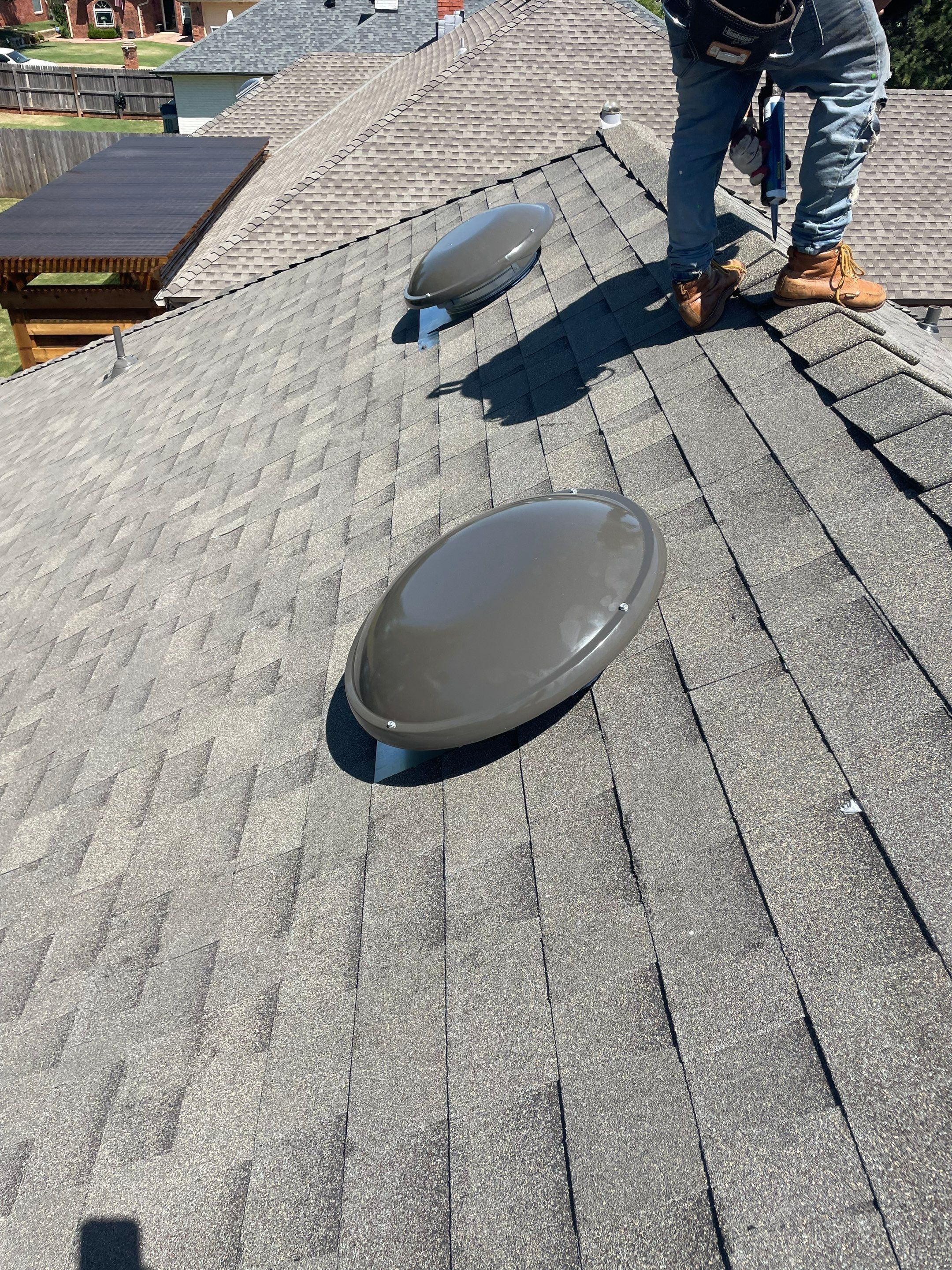 roof, skylight, & vent replacement in Edmond by McCann's Roofing and Construction