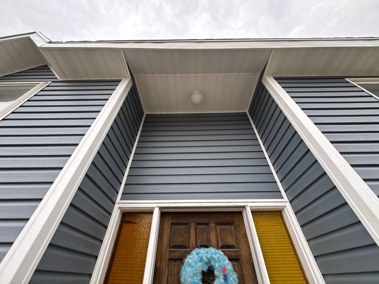 Salt Lake City | Structural Rebuild & Premium Vinyl | English Wedgewood & White by Ideal Siding Utah