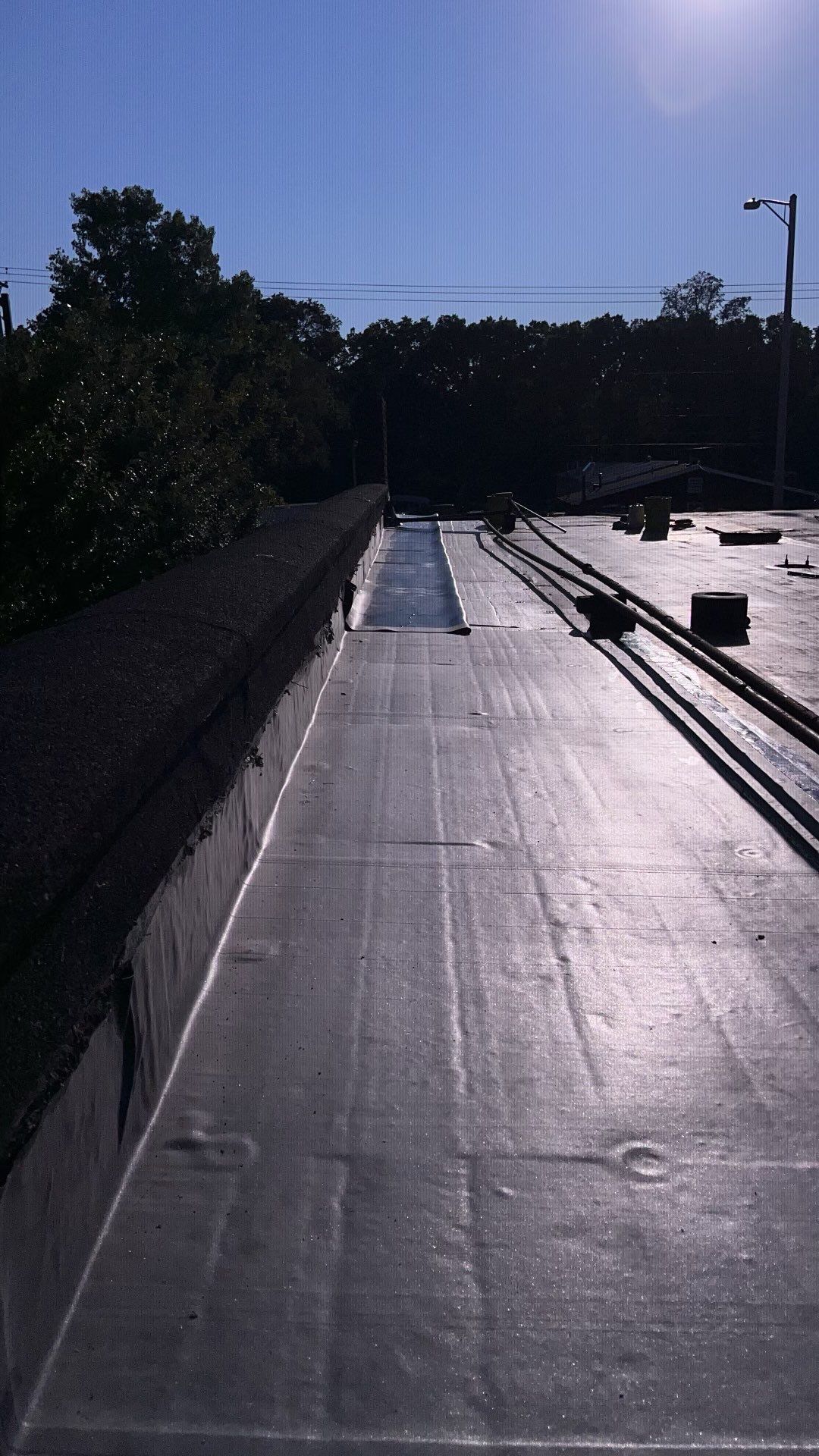 Commercial Roofing Repair using 60 mil rubber roof  by Nitro Roofing and Construction