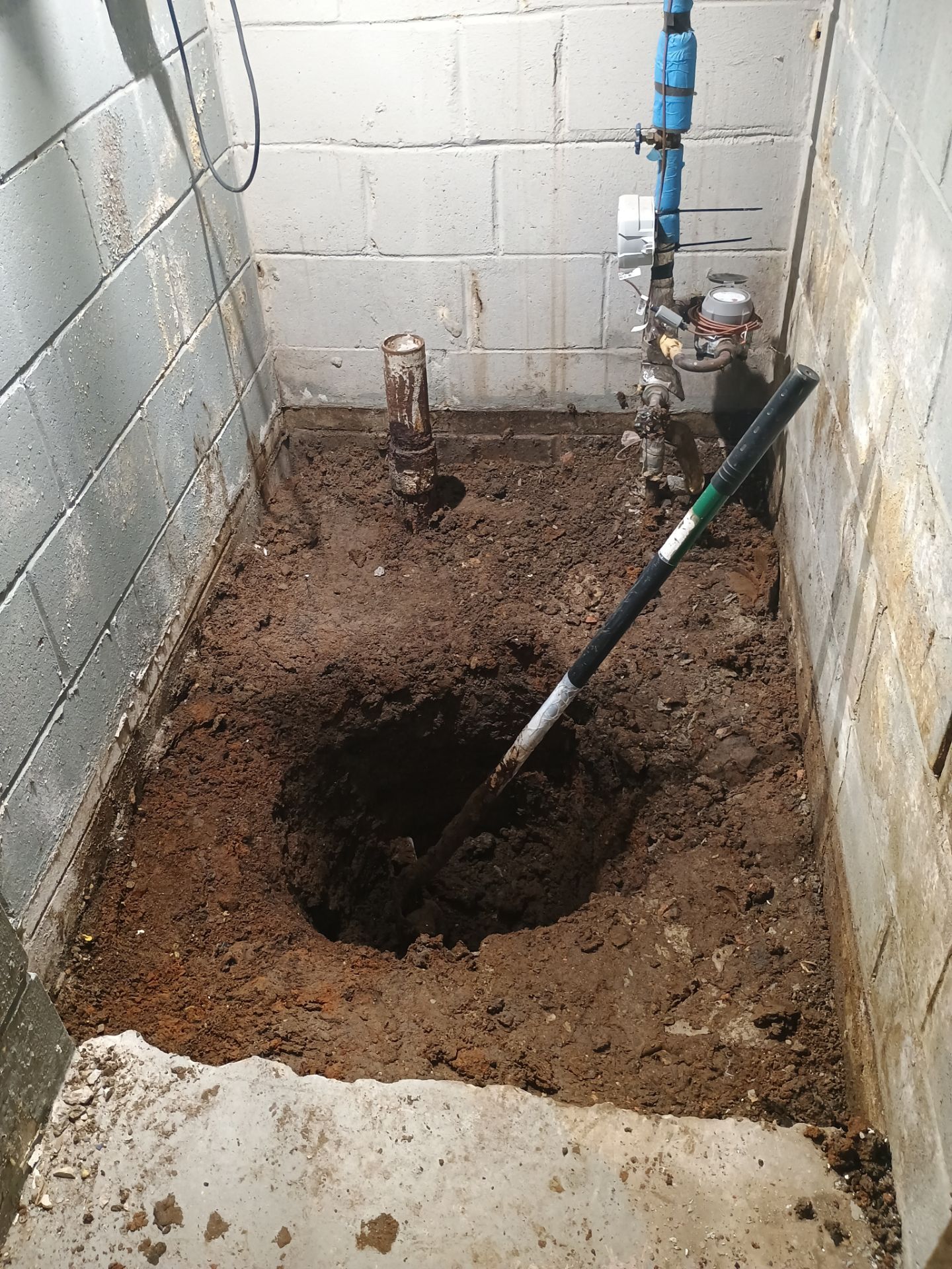 Interior Drain Tile & Sump Pump System in West Minneapolis by Waterproofing Northeast