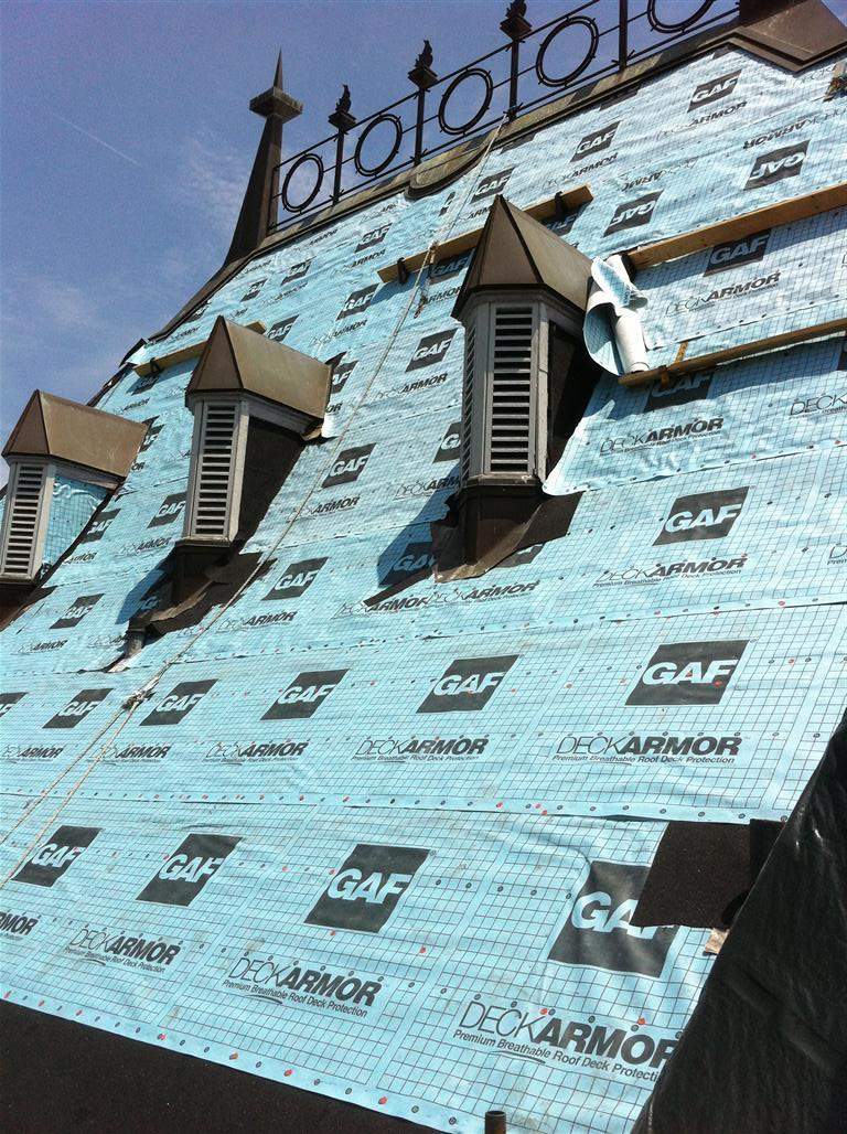 Historic Building ROOF REPLACEMNT with GAF TruSlate  on steep slop and Versico 60mil TPO on flat roof by Gorilla Exteriors Contracting, LLC