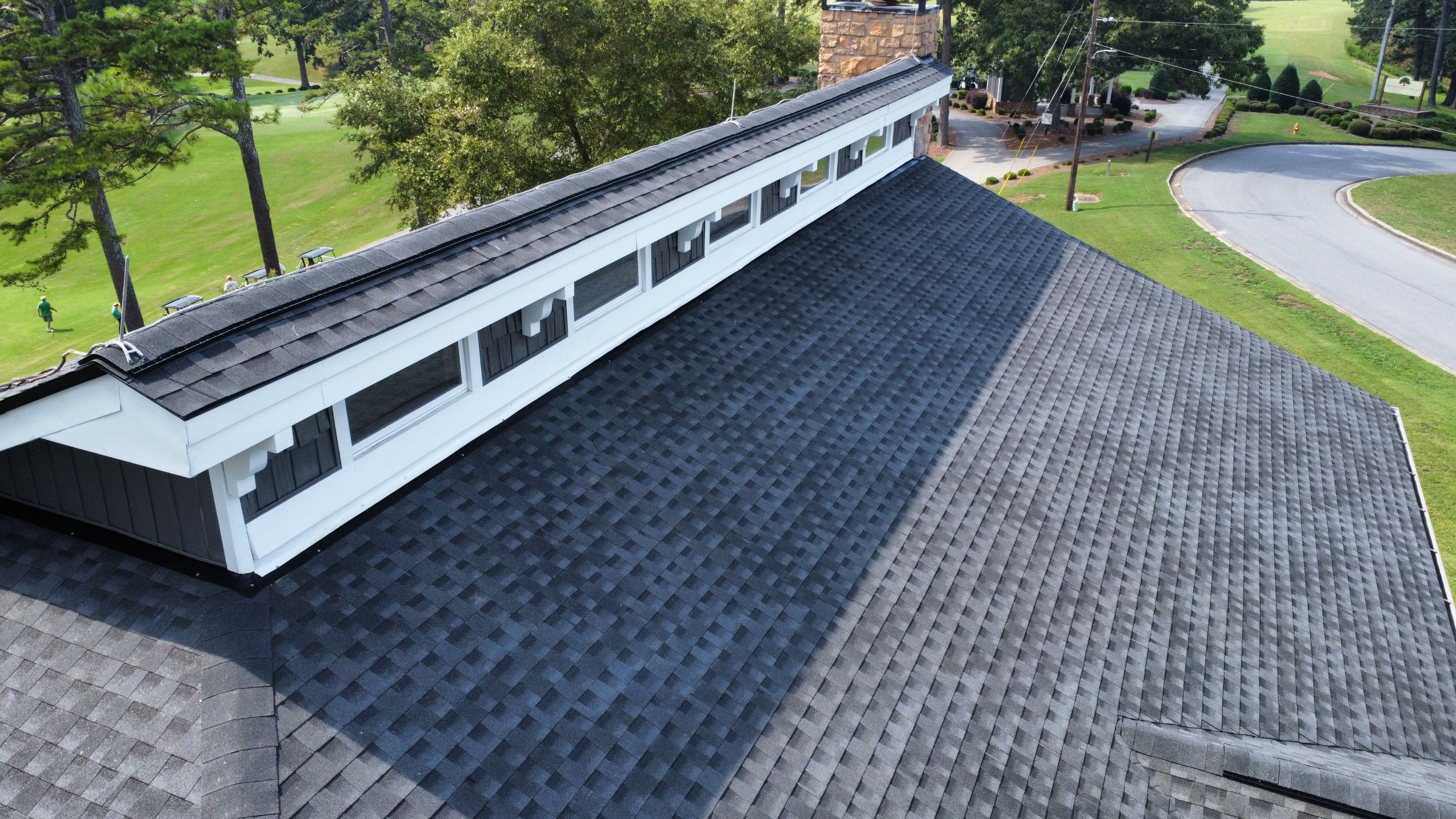Country Club Roofing Installation by Reset Roofing