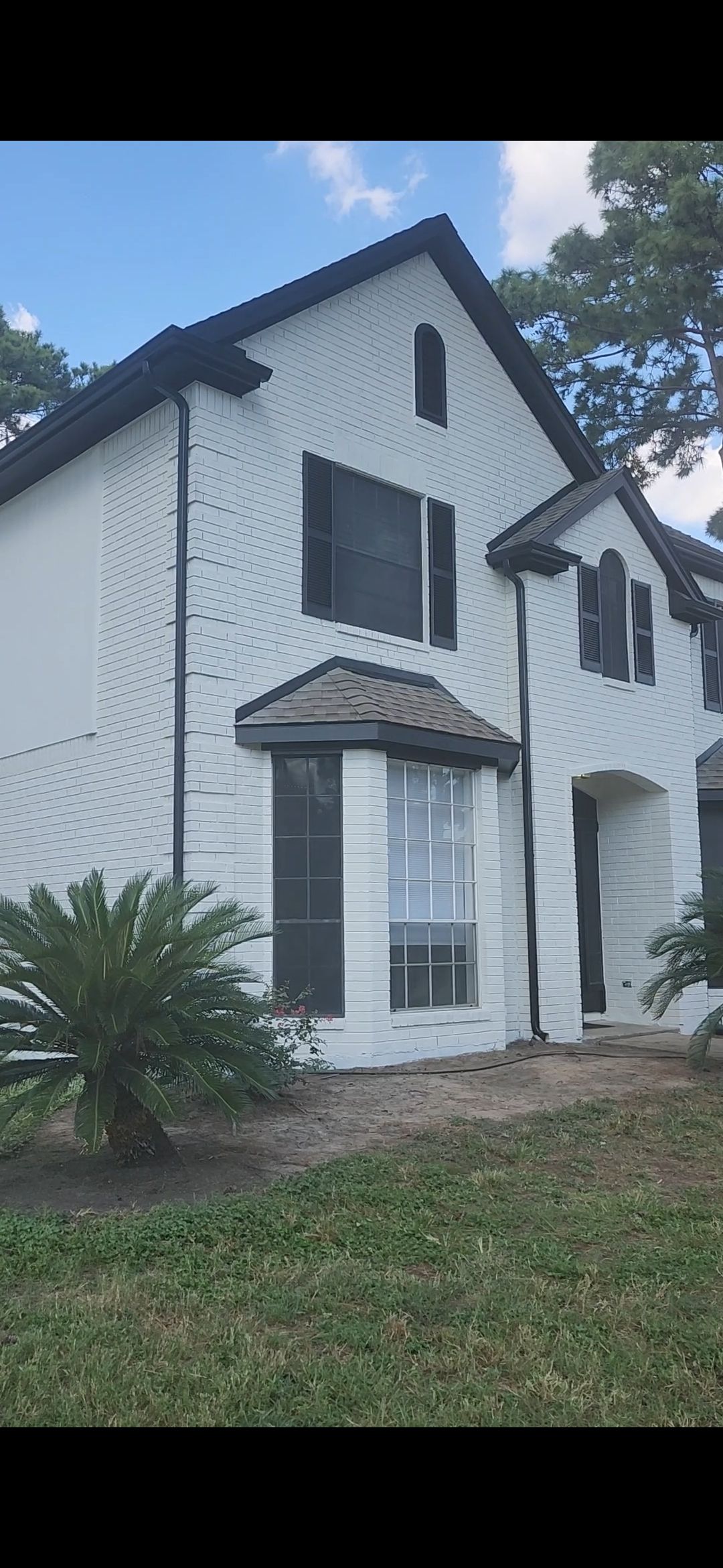 Brick Home Transformation by Fresh Coat Painters of Cypress