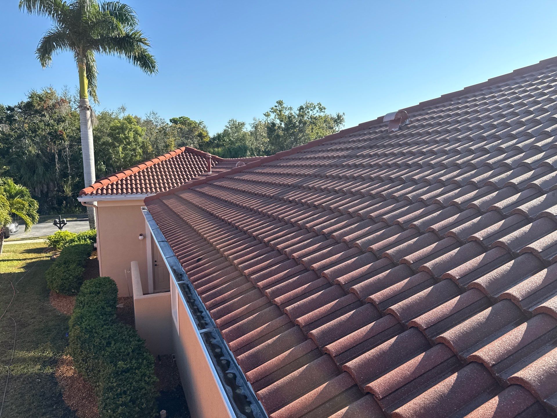 Tile Roof Cleaning & Oil Stain Removal | Tara River Place, Bradenton FL by Sunshine AquaWash
