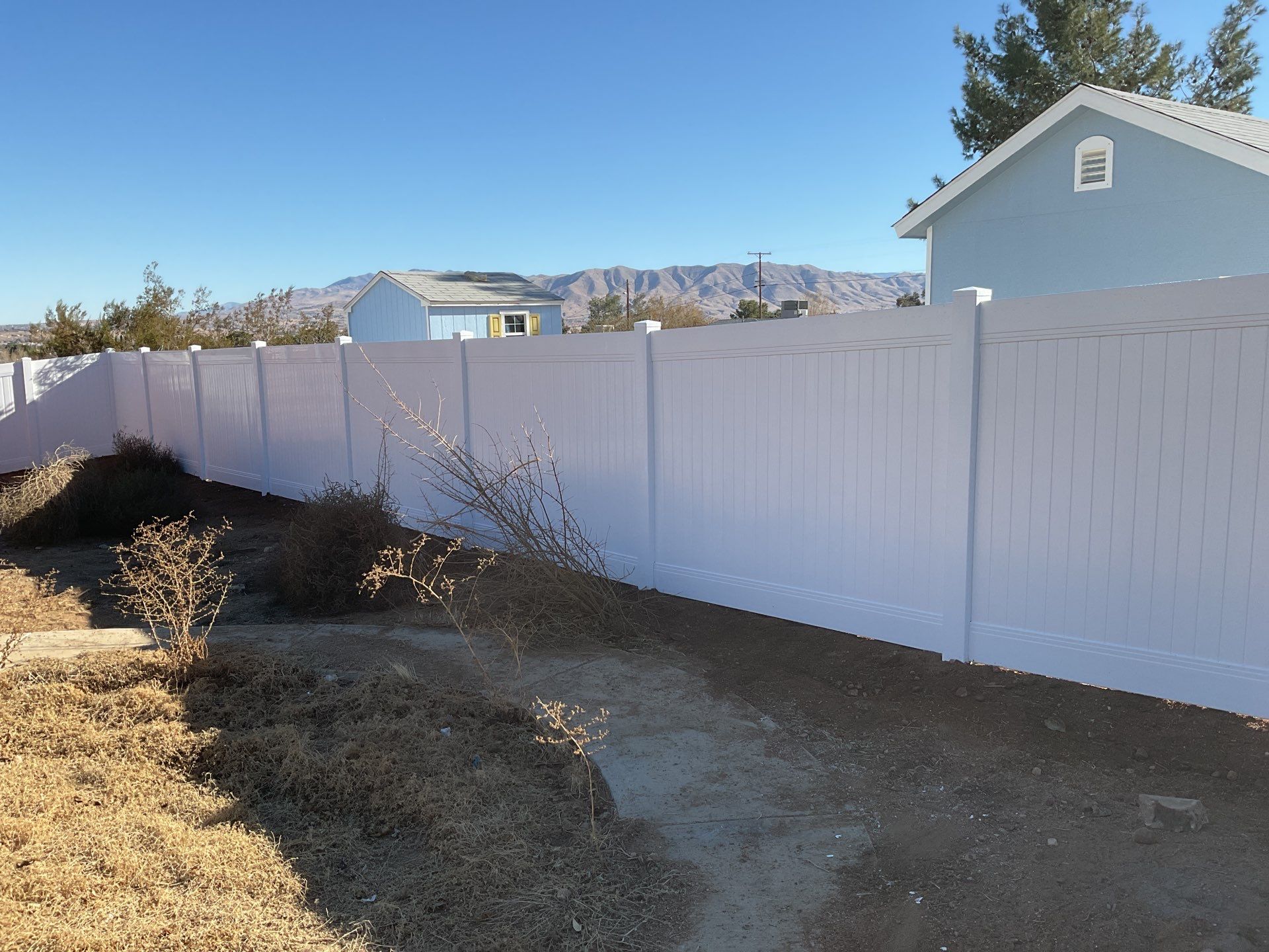 Fence Installation using vinyl and chain link  by Fence Guys Inc. 