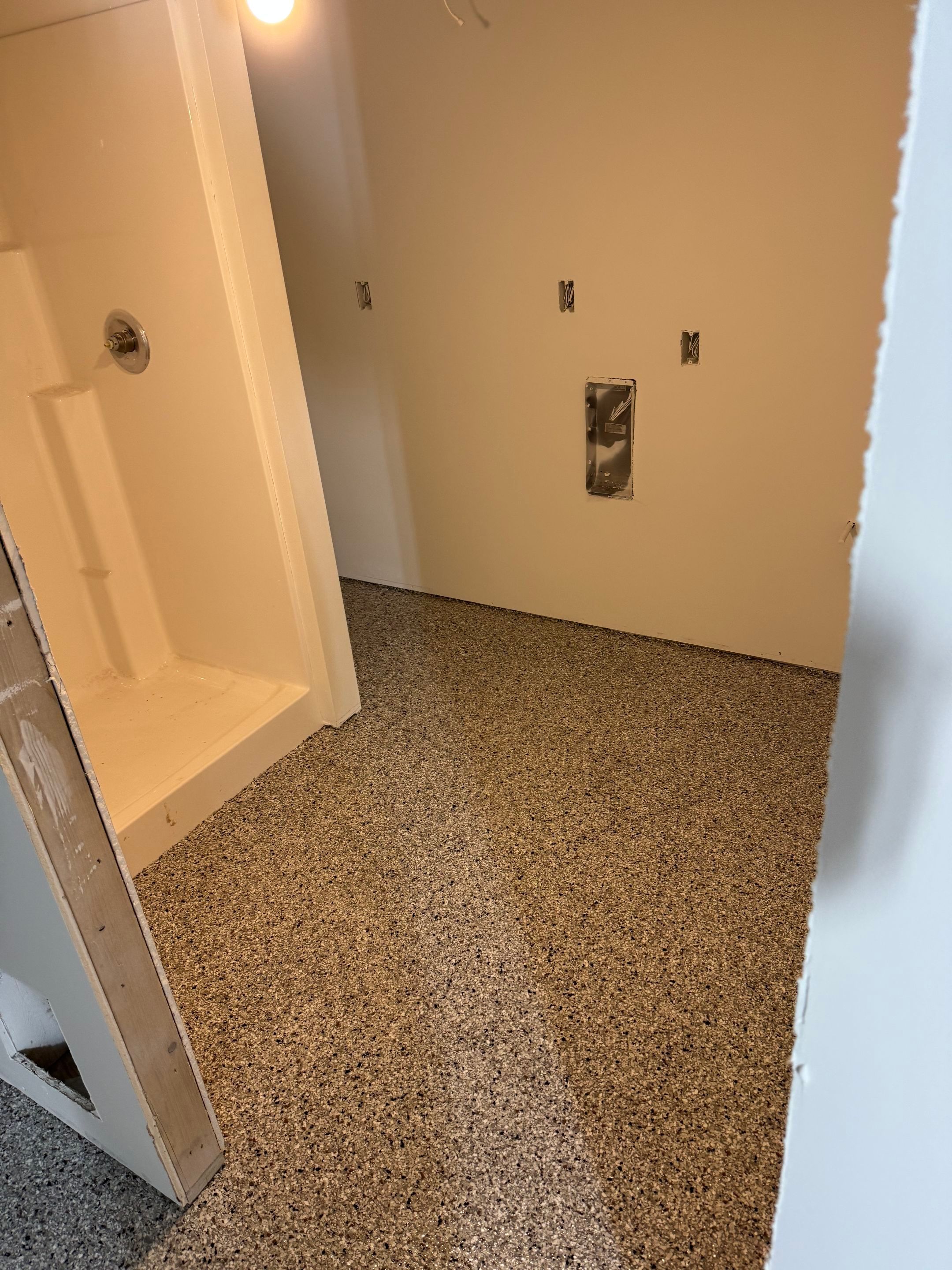Custom Garage and Basement Epoxy Floor Coating in Menno by Select Painting, Coatings & Garage Cabinets