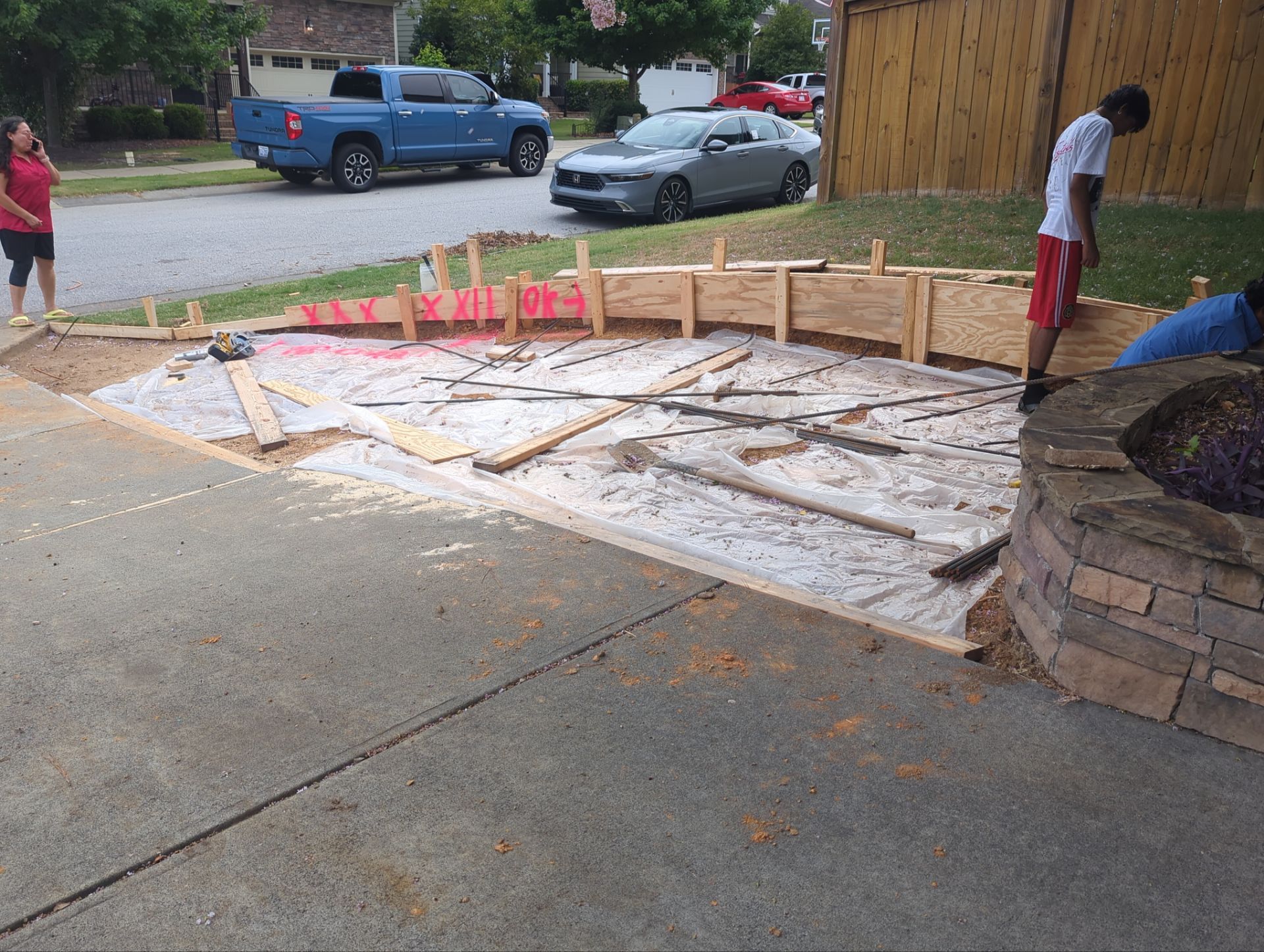 Concrete Driveway Expansion & Retaining Wall | Apex, NC by Elite Remodeling and Design LLC