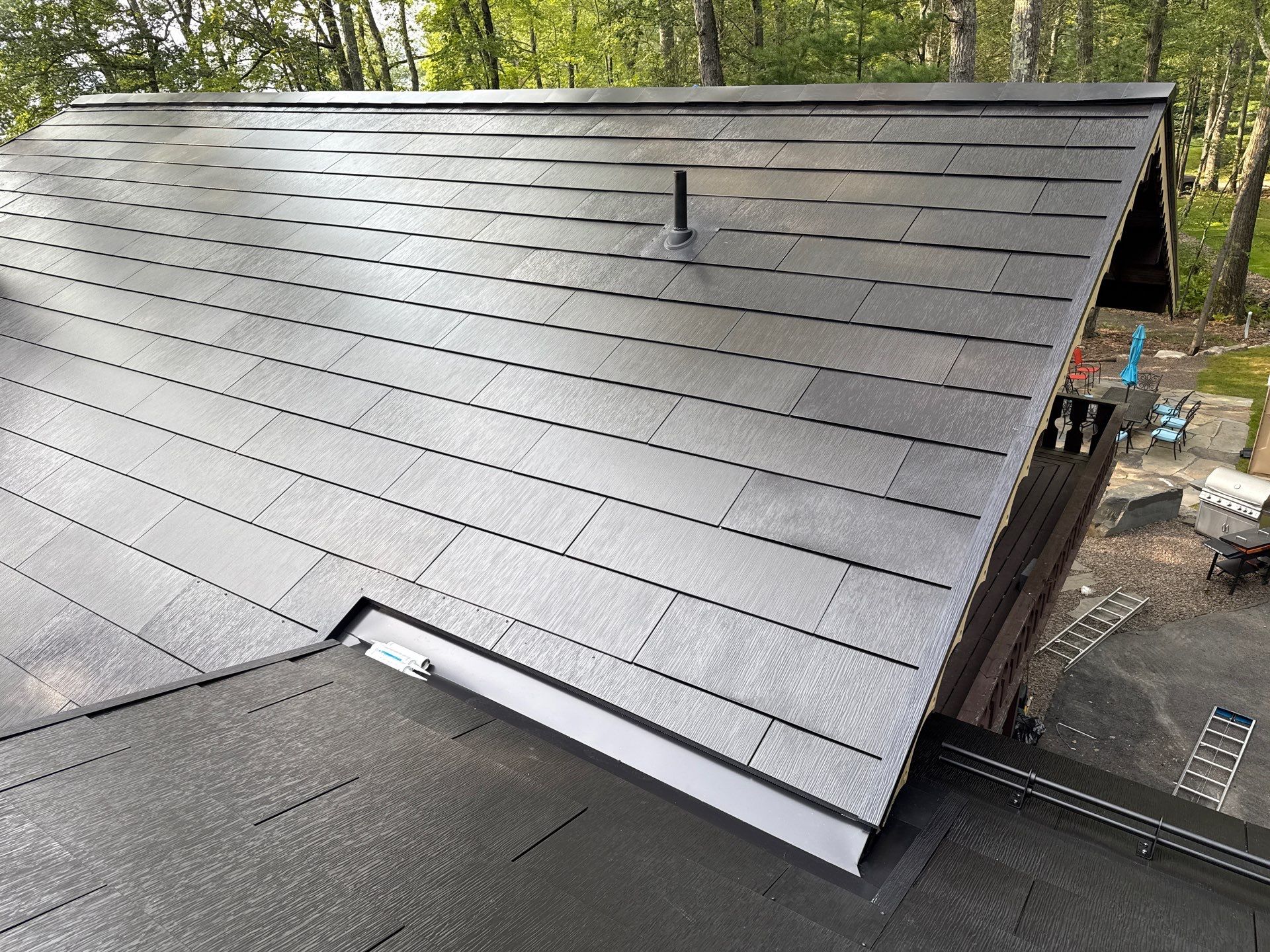 Stunning Tesla Solar Roof Cabin in the Woods by American Home Contractors