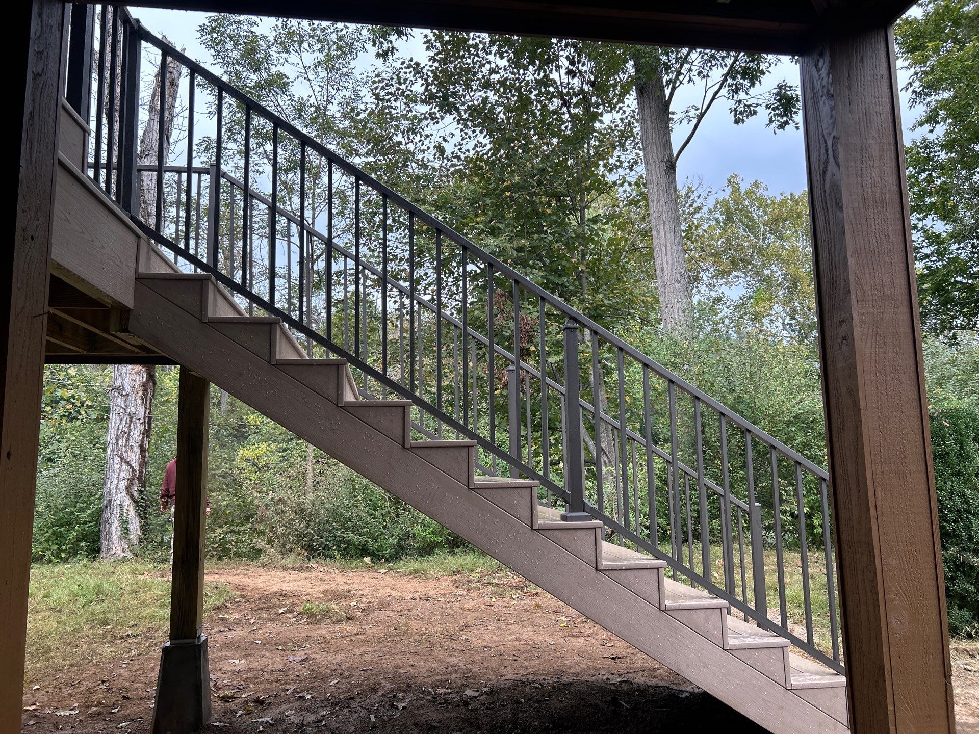 Log Cabin Wrap-Around Deck and External Staircase Installation in Caldwell by Walnut Hollow Decks & Outdoor Living