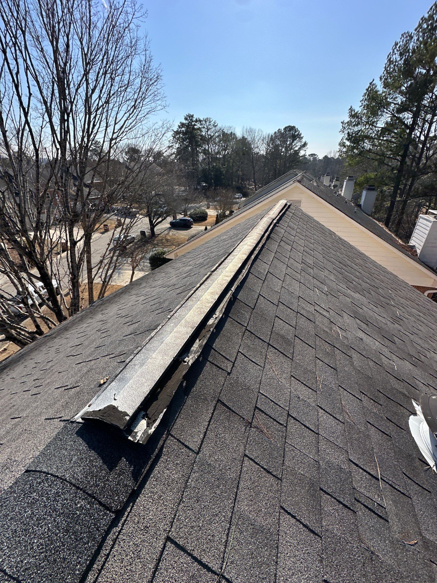 Chimney Cap, Ridge Vent and Pipe Boot Replacement in Birmingham by The Roofing Dudes