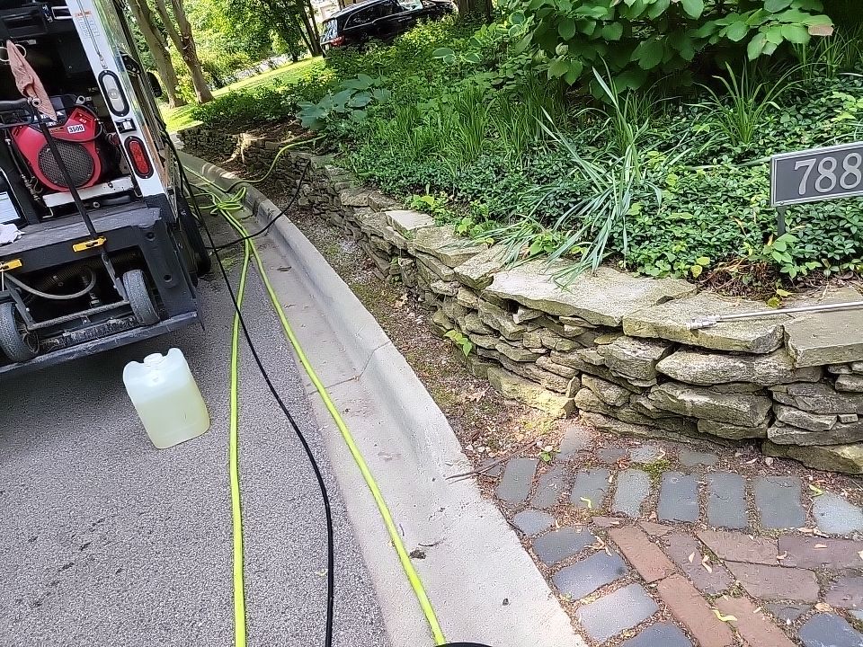 Glencoe, IL brick paver clean sand seal, repair, and reseal by Northern Power Washing LLC.