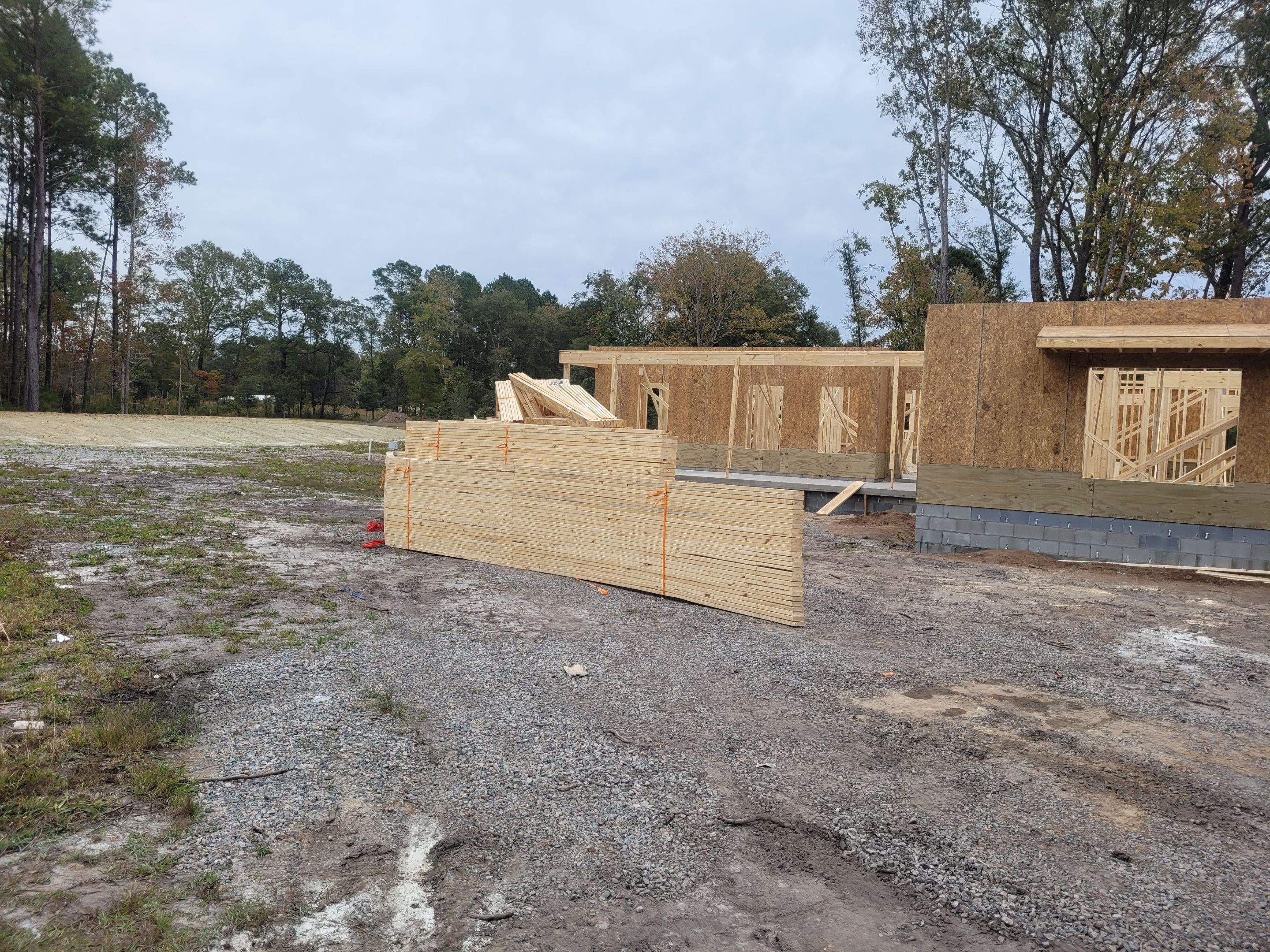 New Home Construction using brick and vertical vinyl by Cornerstone Home Builders, LLC