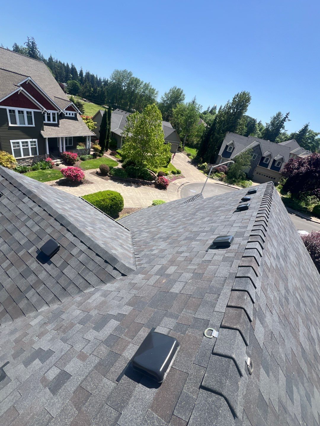 Residential Roofing Installation using Malarkey Vista (Color: Black Oak) by Orezona Building & Roofing Company, Inc.