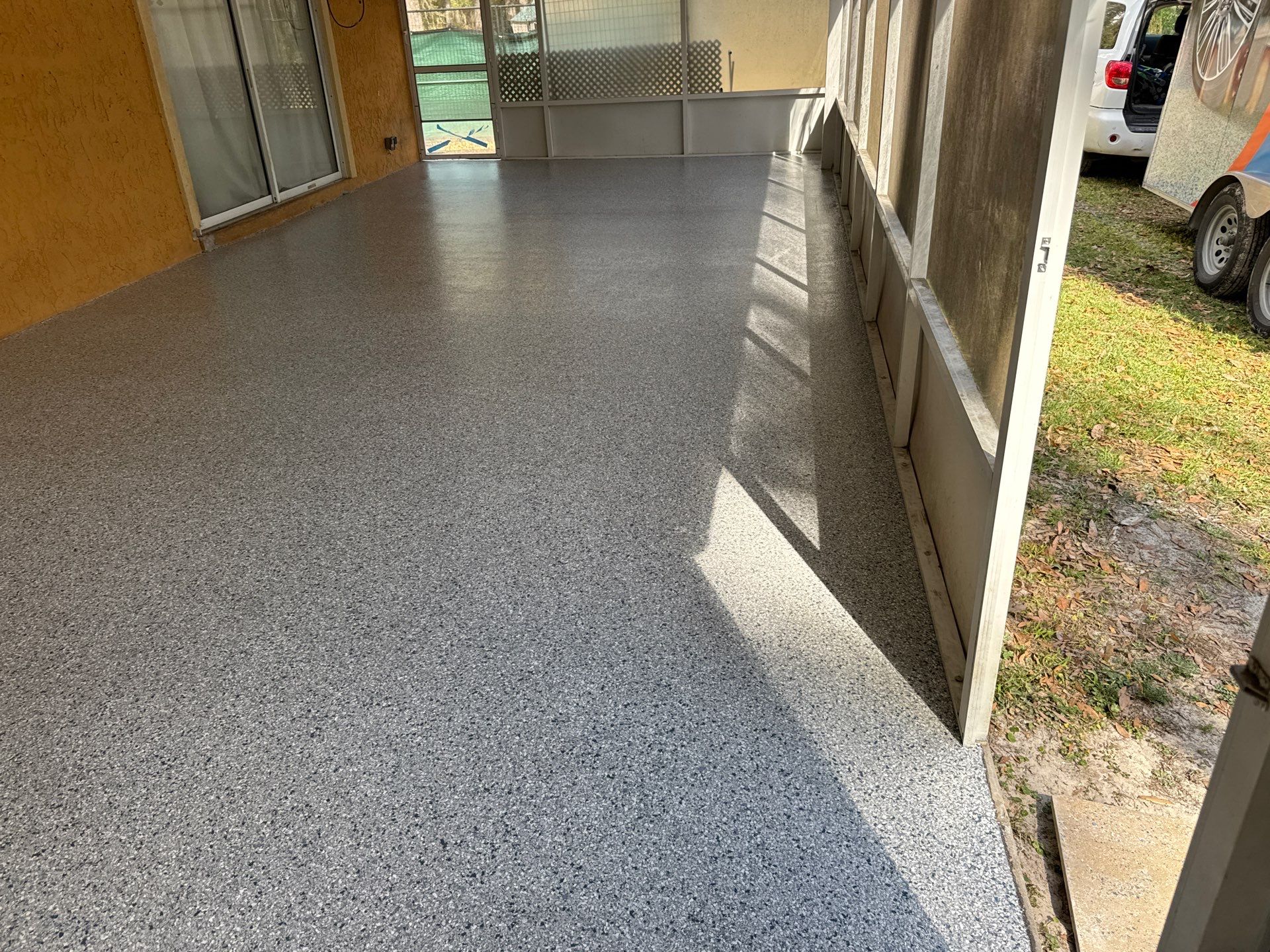 Patio in Tidal Wave by Cross Creek Concrete Coatings