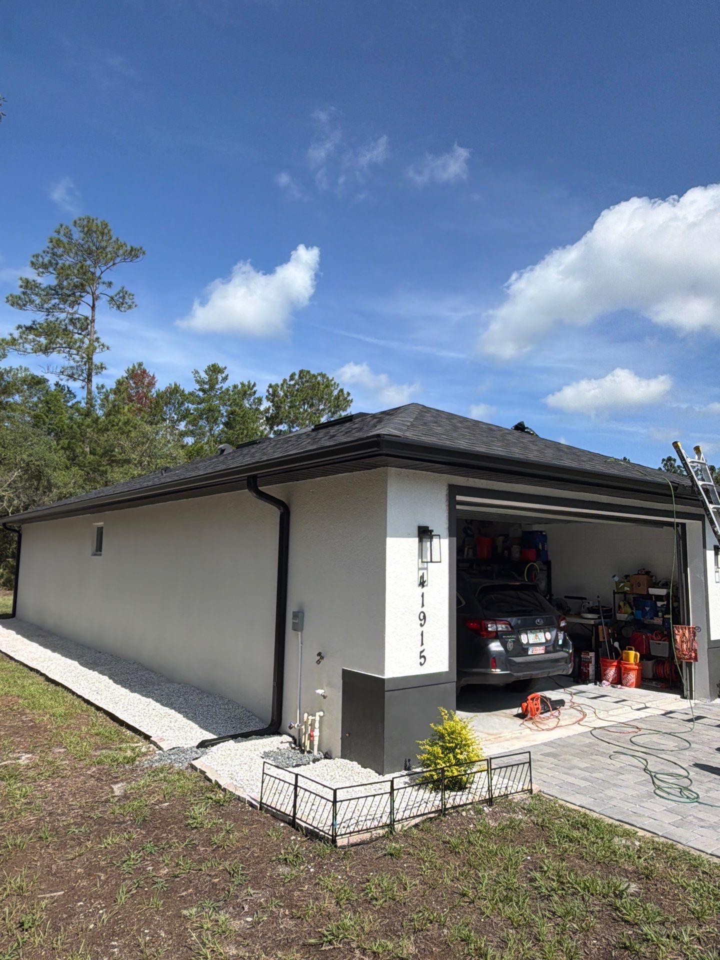 GAF Asphalt Shingle Roof Replacement with Skylight in Eustis by Fortified Roofing Solutions Corp.