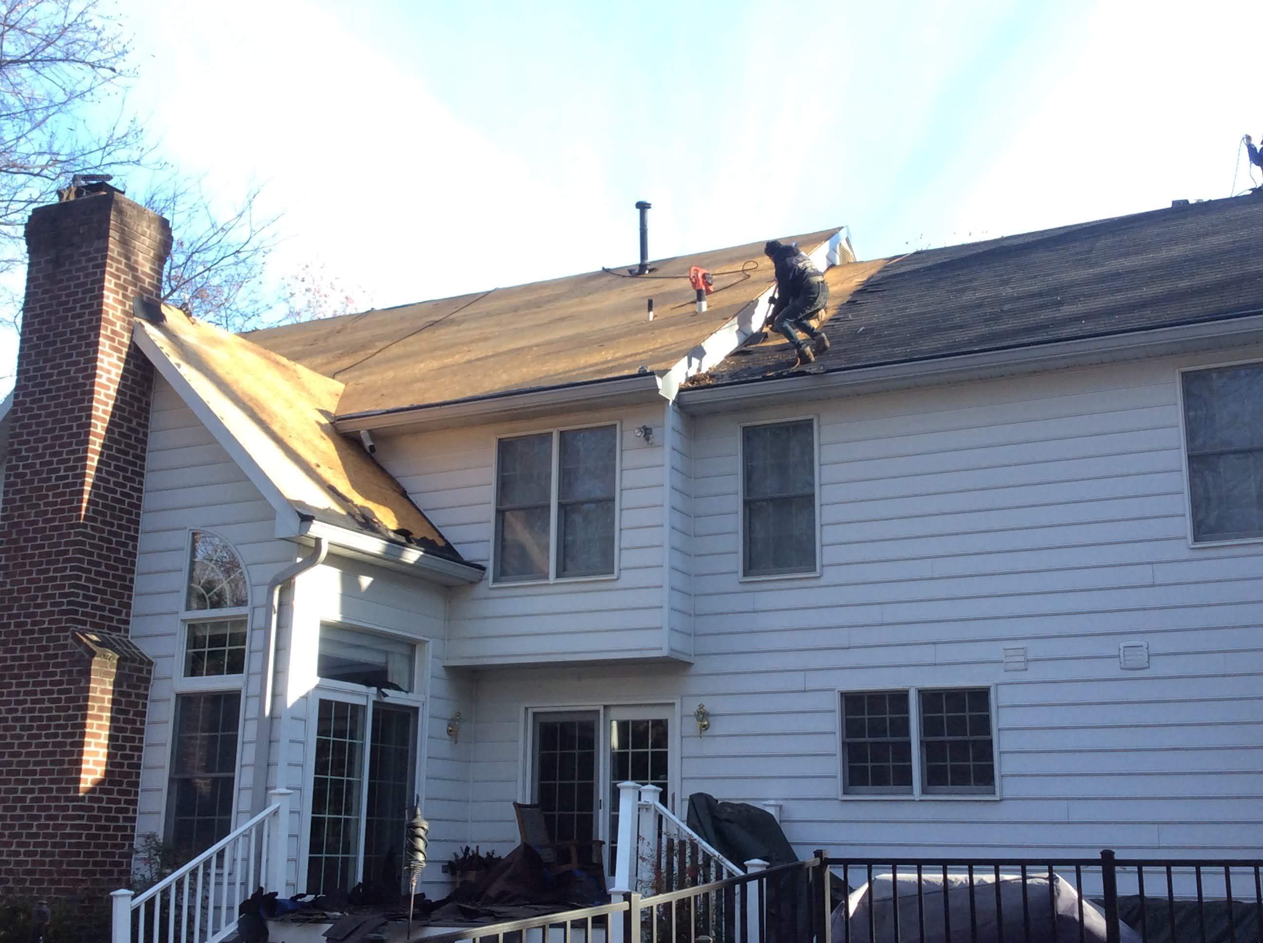 Residential Roofing Installation using Charcoal Black by Alpha Design Services