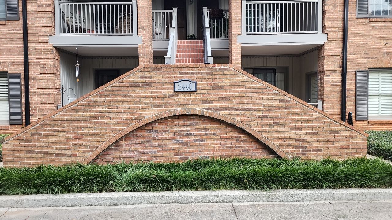 building clean using cleaner by Power Wash Masters LLC