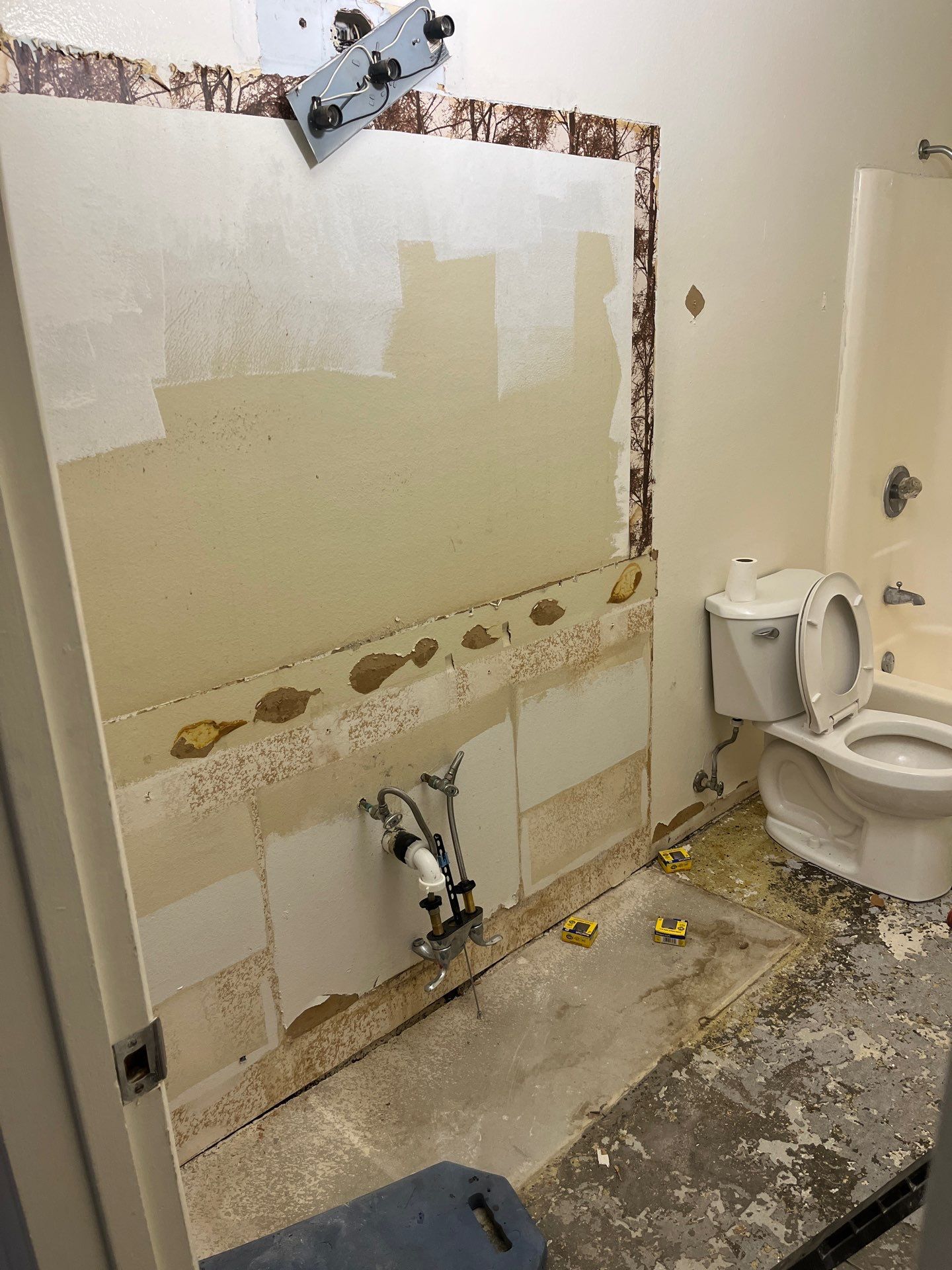 Scope of Work: Installation of Shower, Toilet, Plumbing, Kitchen Sink, and Fixtures by Us Plumbing 