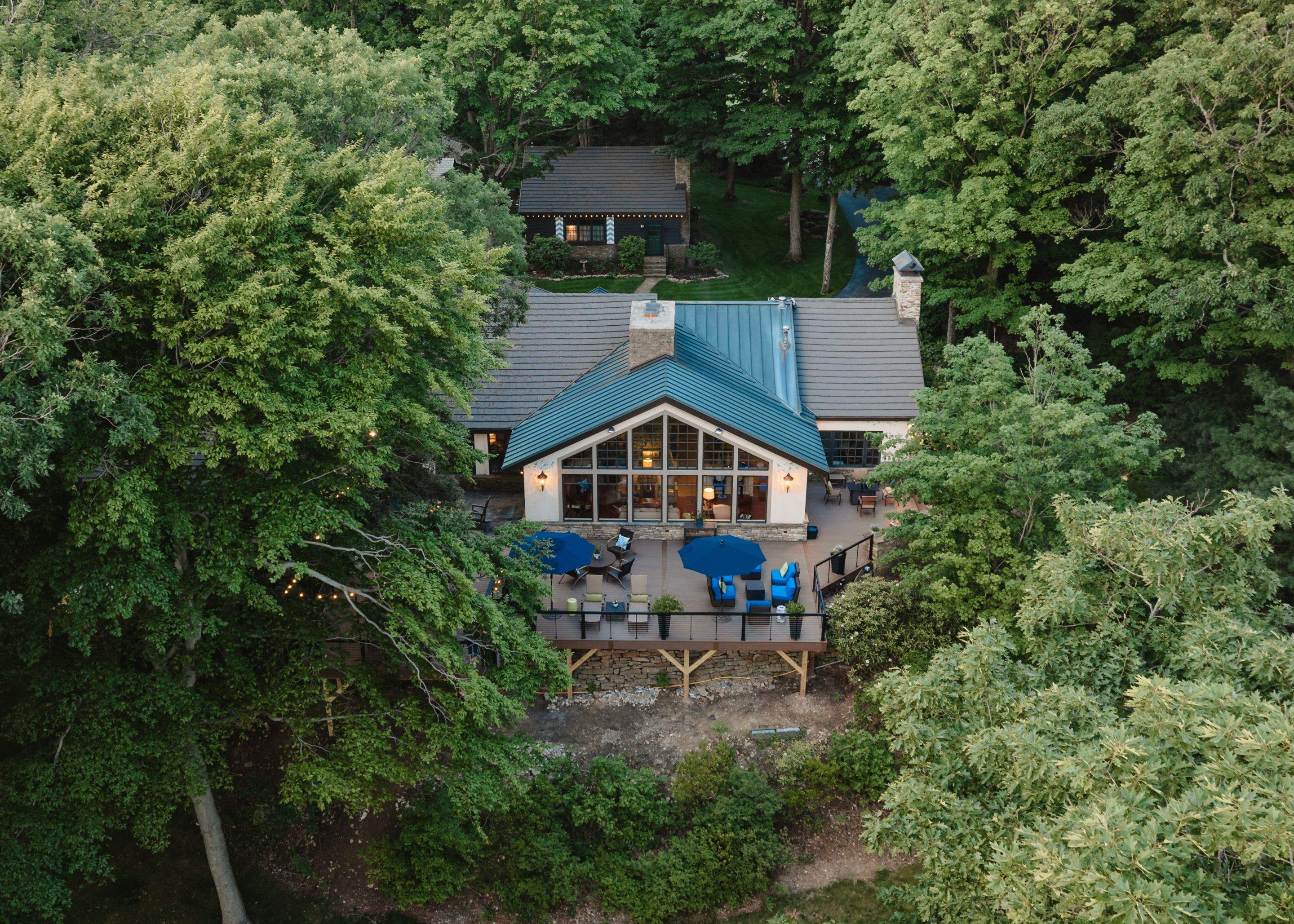 1500 sq/ft Composite Deck Build with Outdoor Kitchen in Champion by Cousins Roofing Siding & Decks