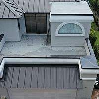 24ga 1.5" Mechanical Seam Matte Black by Total Roofing System The Metal Roof Experts