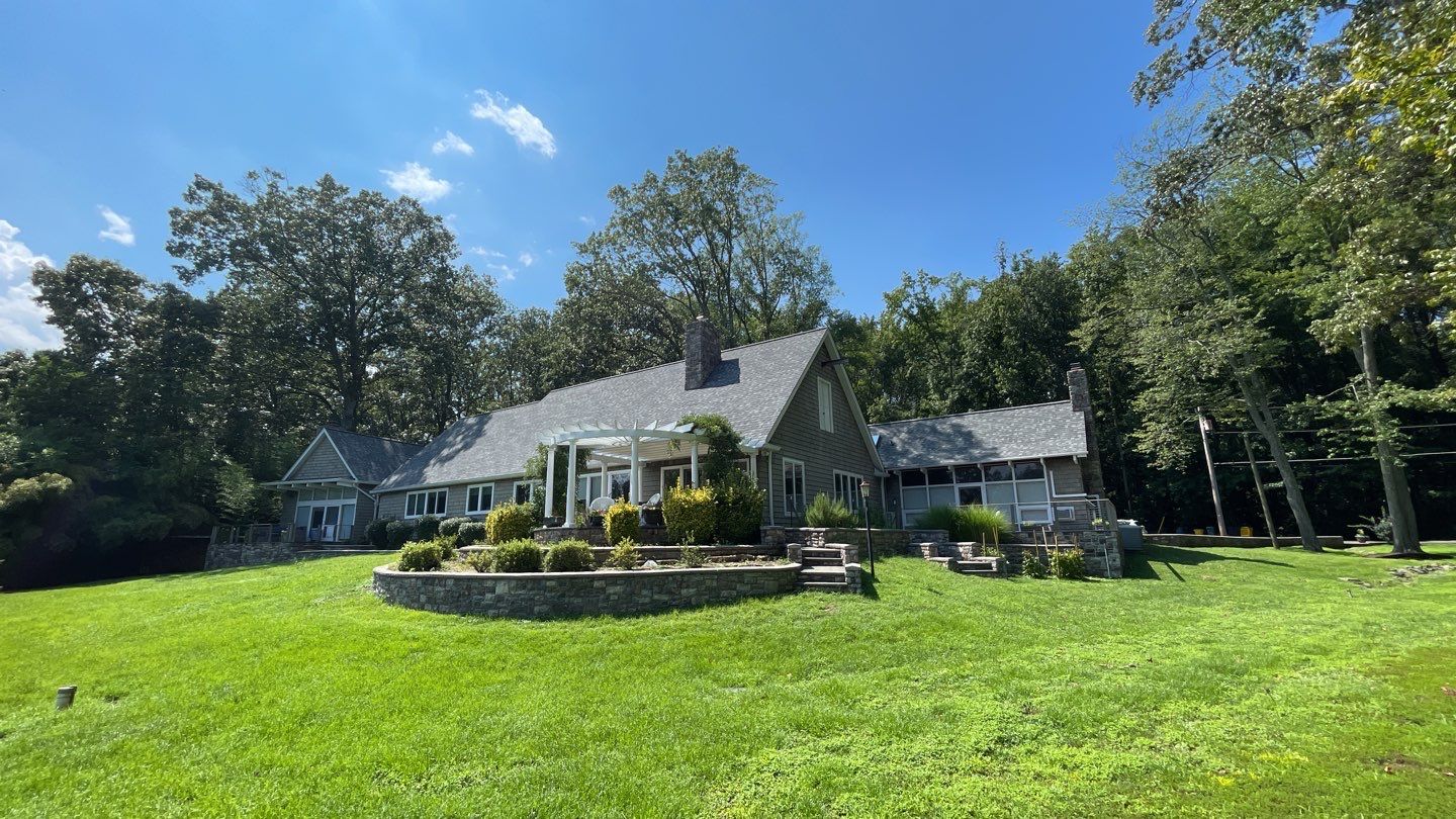 Roof Replacement using IKO Dynasty by American Home Contractors