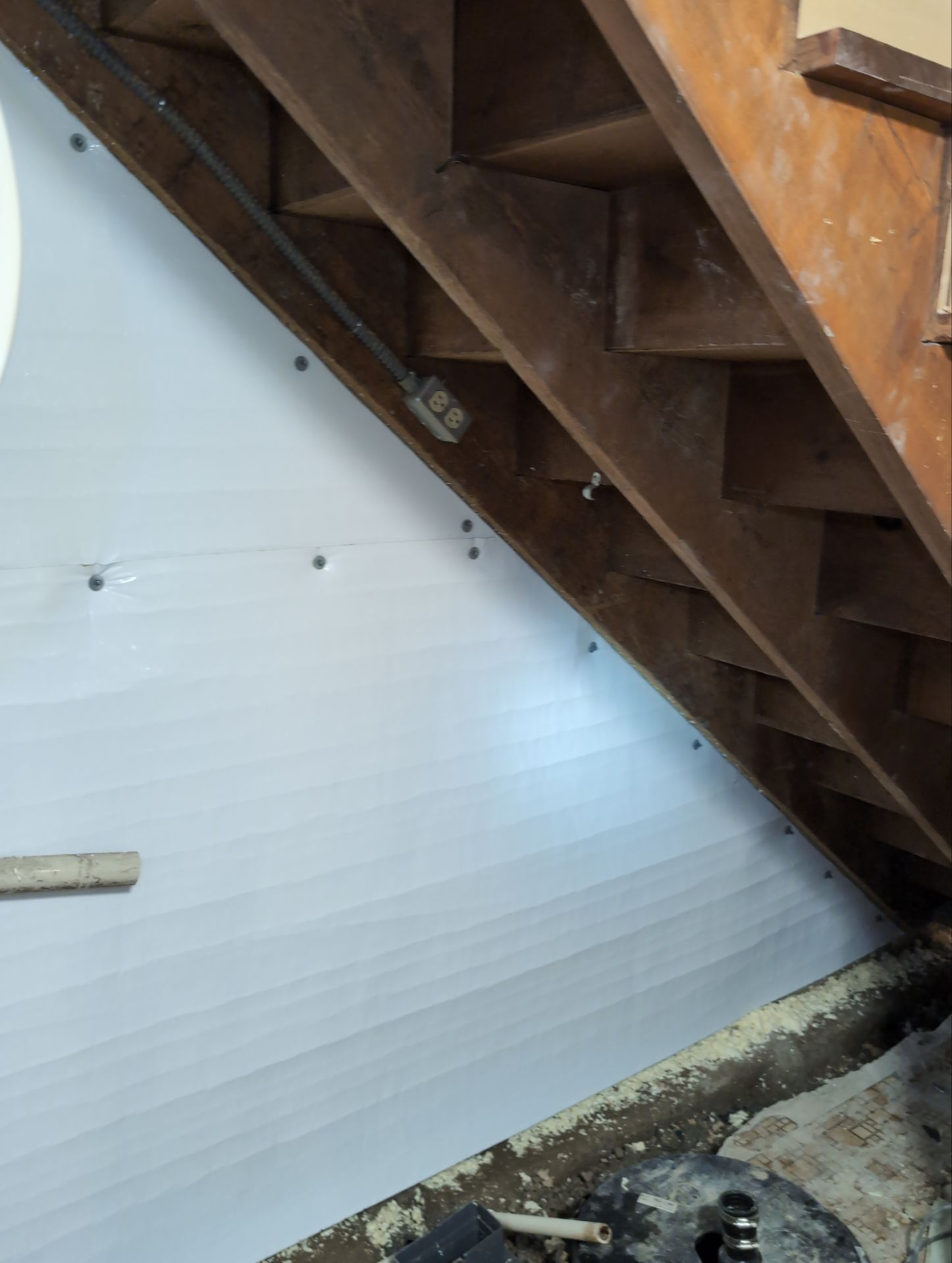 Interior Basement Waterproofing System and Egress Window Installation by Toledo Basement Repair 