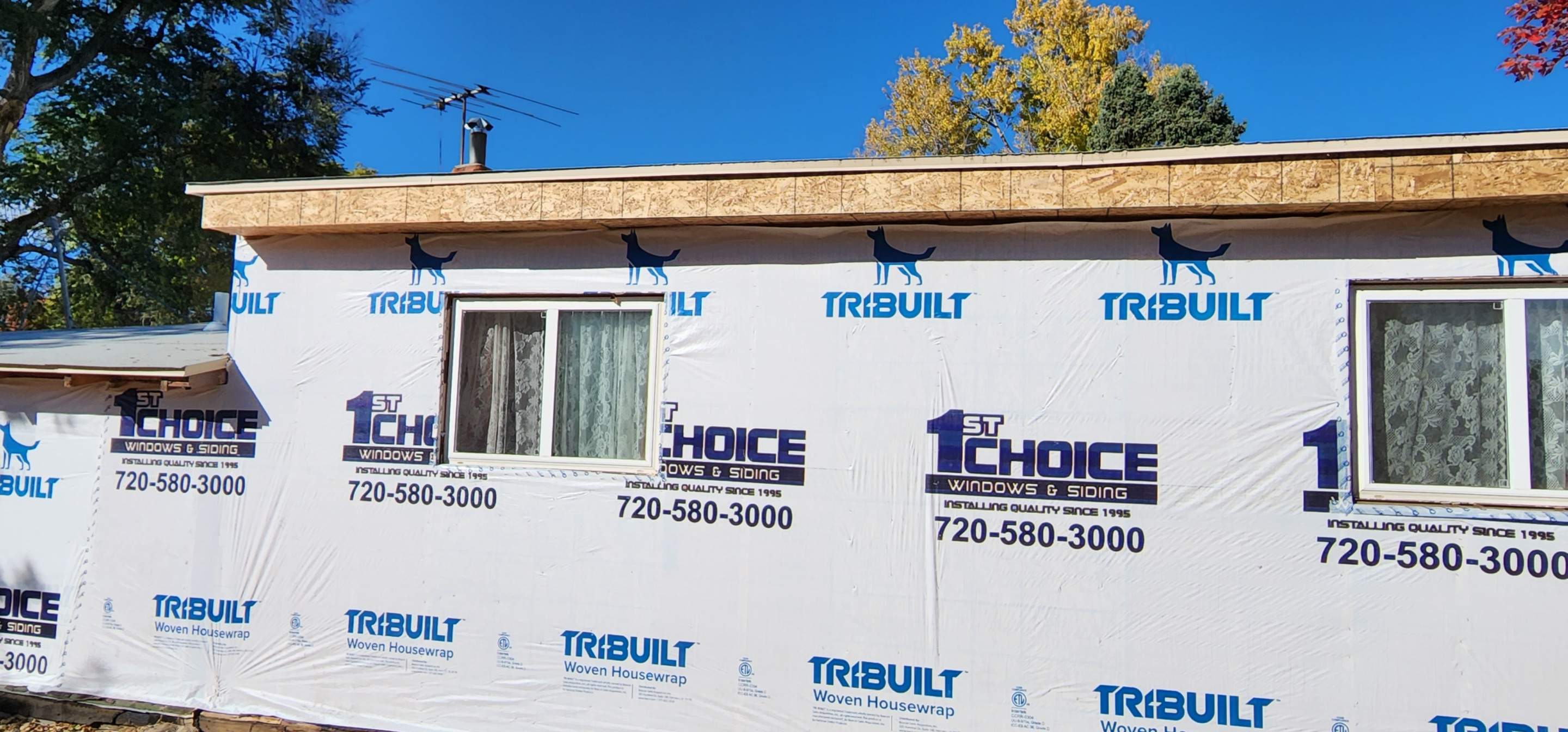 Beautiful little home in Denver receiving Lp Smartside Siding by 1st choice windows and siding
