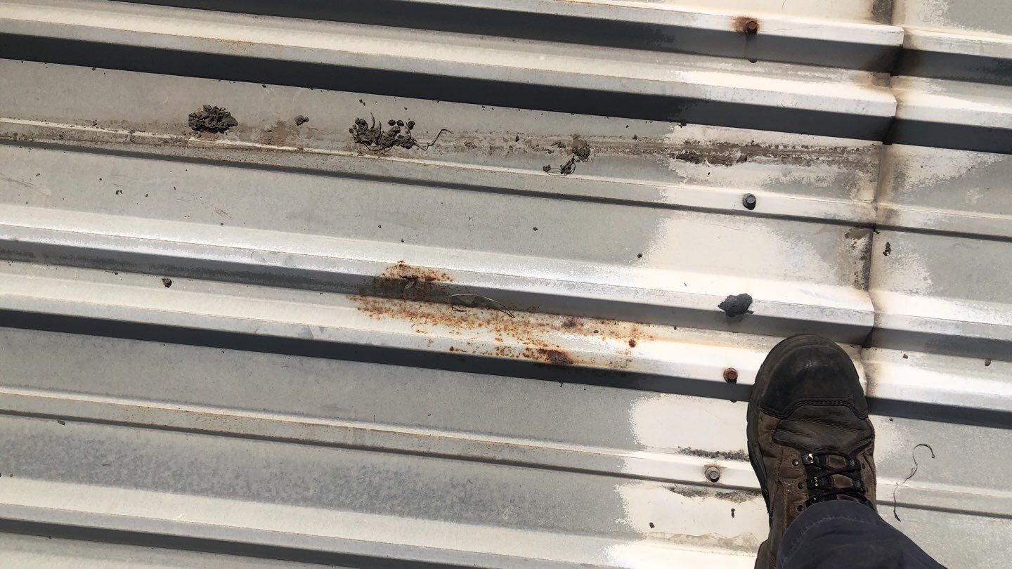 Metal Restoration Roofing system with Benchmark/PUMA XL 20 yr warranty by Straight Edge Roofing Inc