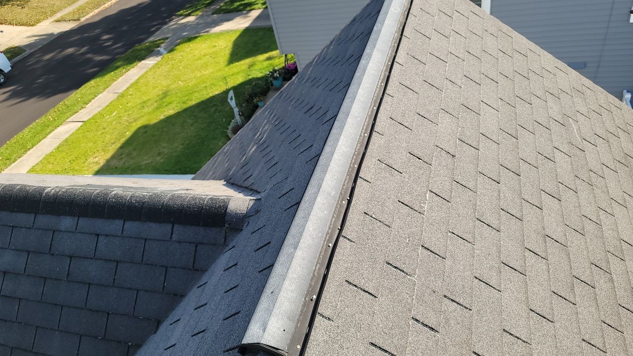 ATLAS PINNACLE PRISTINE COLOR: COPPER CANYON DRIP EDGE: WHITE by Eagle Eye Roofing