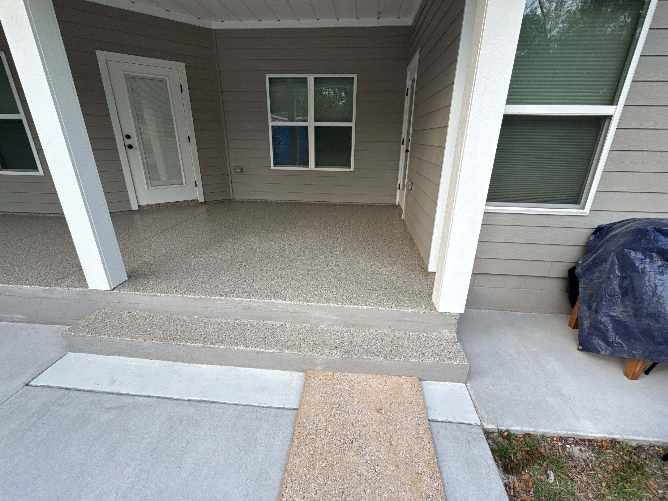 Patio and Sidewalk in Fort White, FL (Patio in Mediterranean, Sidewalk in Claystone Custom Hybrid) by Cross Creek Concrete Coatings