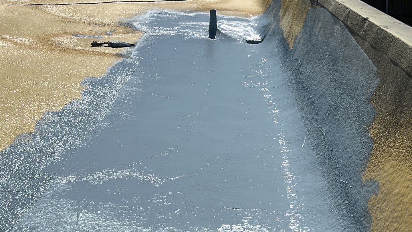 Foam Refurbish using Conklin Benchmark/PUMA XL coatings and spray foam; Also metal roofing around parapet wall by Straight Edge Roofing Inc