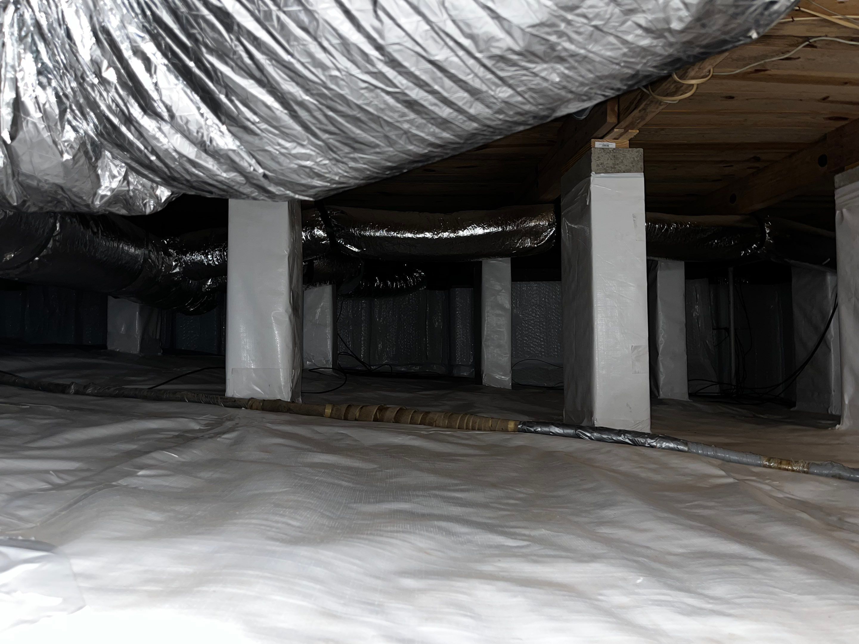 Impact Choice Encapsulation with new piers and crawlspace door. by Impact Crawlspace