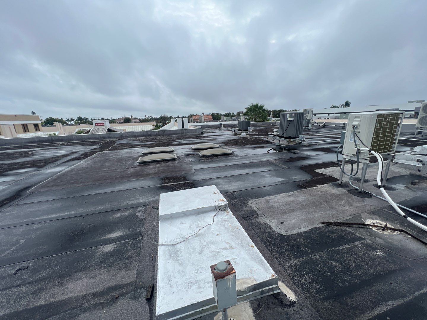 Commercial Roofing Repair using Roof Sealant by Four Peaks Roofing