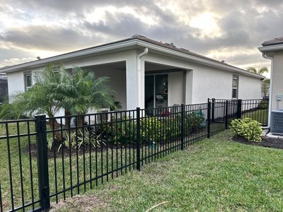Aluminum Fence Installation using Black 3 Rail Aluminum Fence
