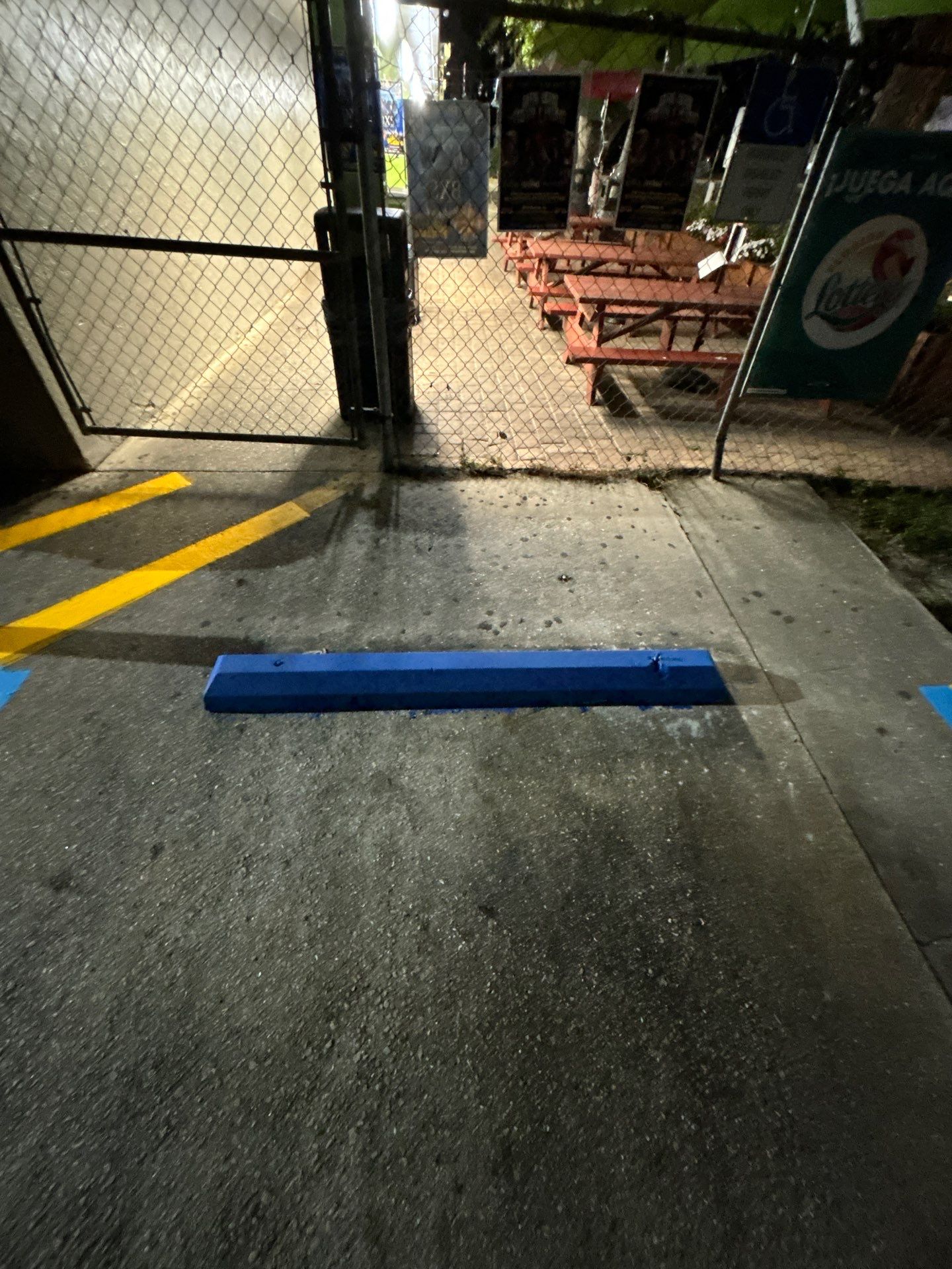 Bollard Installation, Line Striping, & Parking Block Installation at La Primavera Supermarket  by Everline Coatings & Services - Southwest FL
