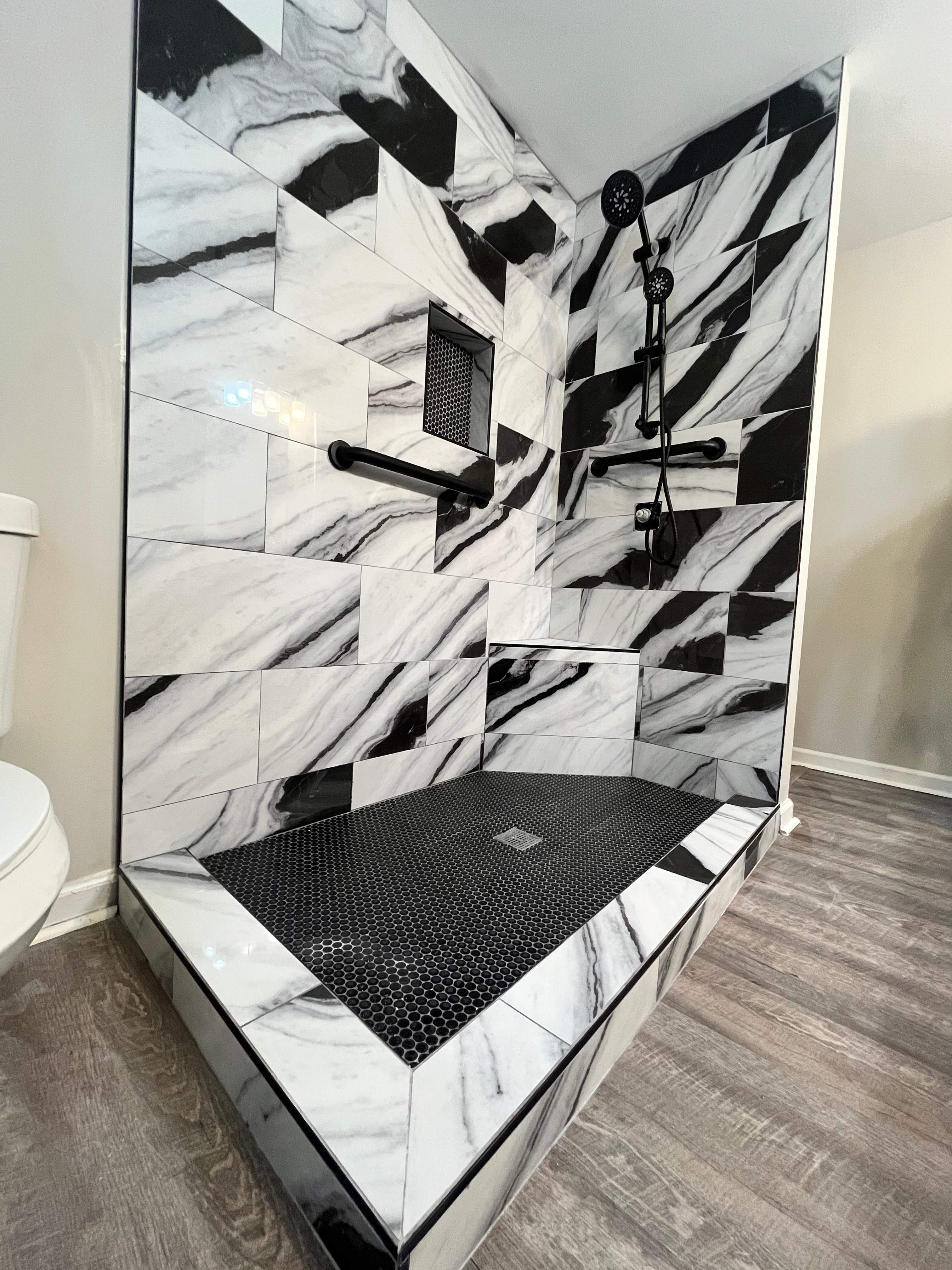Tub to walk-in shower conversion by Prudencio