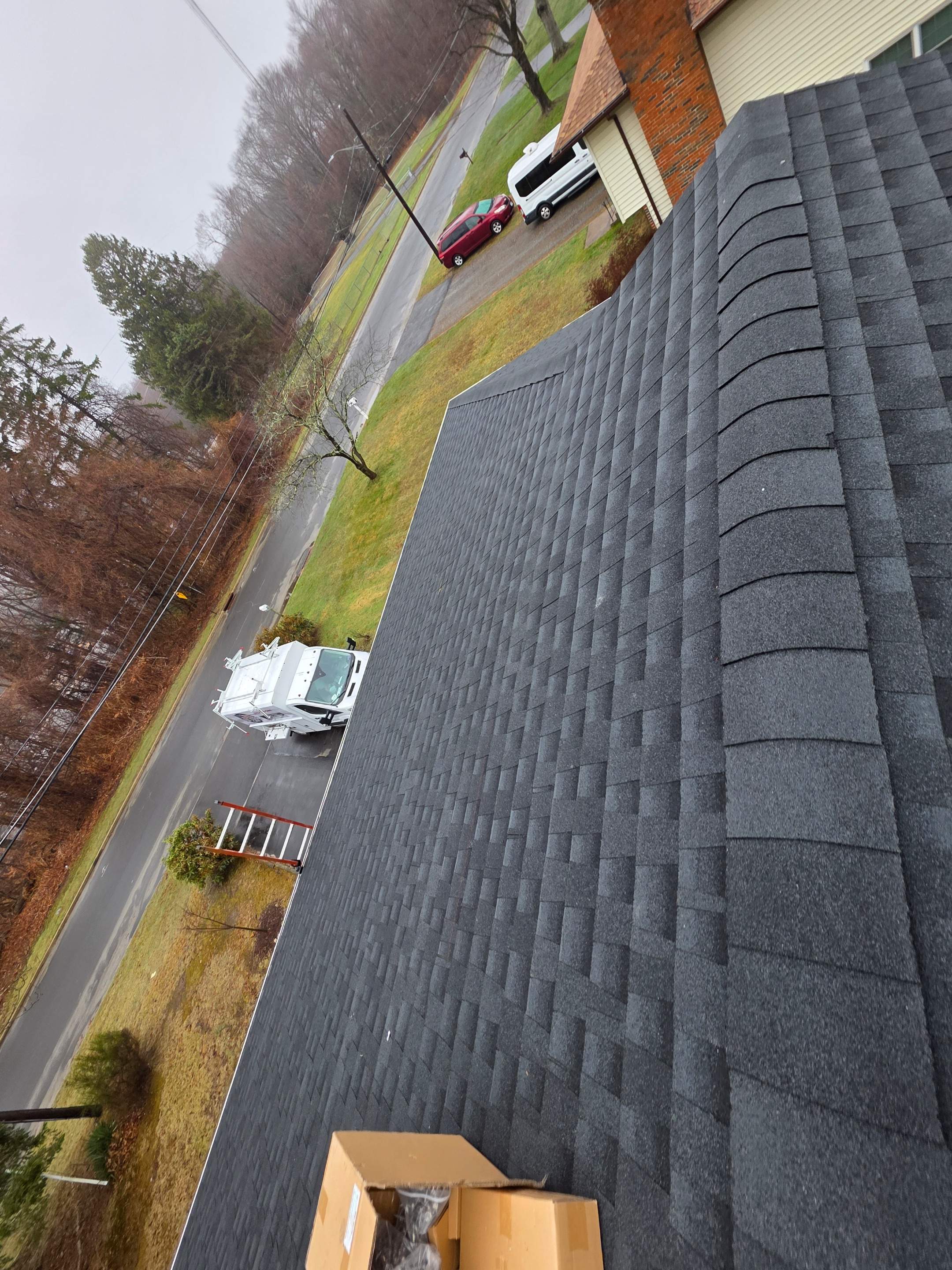 Estate Gray Shingles by Reimagine Roofing