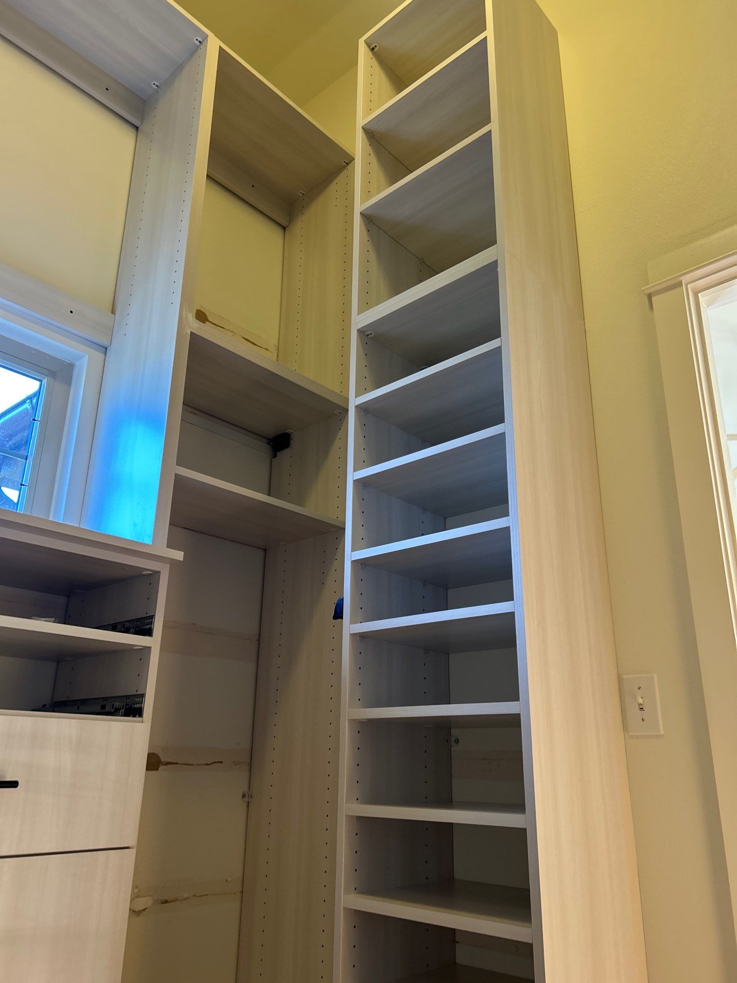 Walk-in Closet in a Small Space by Concept 32, Inc.