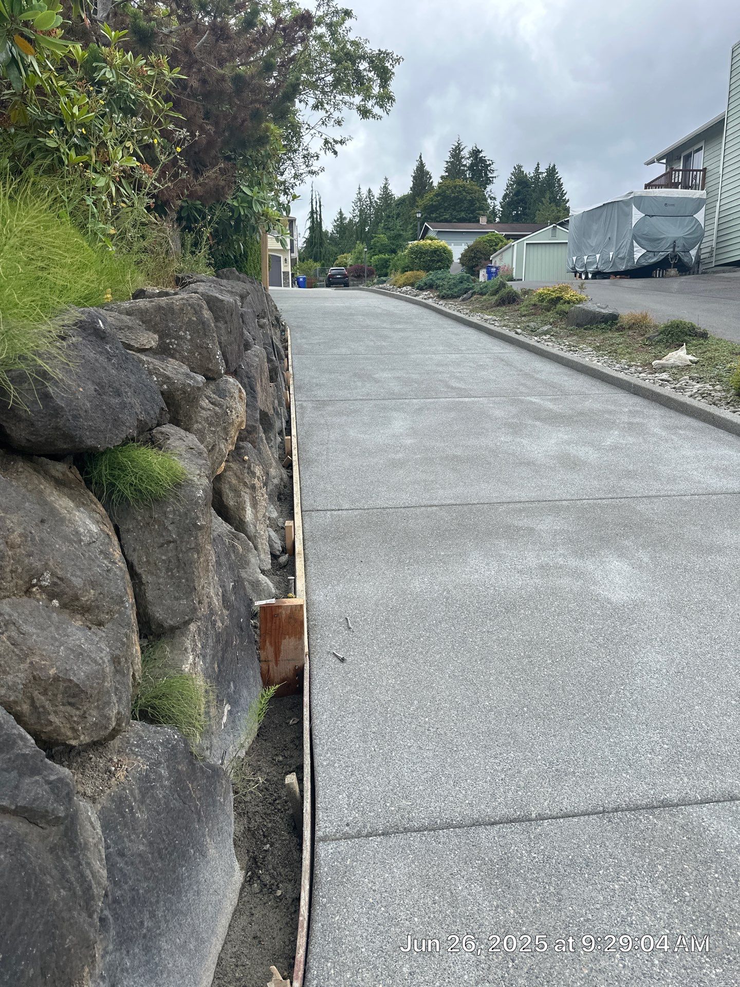 Concrete Driveway Makeover w/ Asphalt Patch | Everett  by Jireh Asphalt & Concrete Inc 