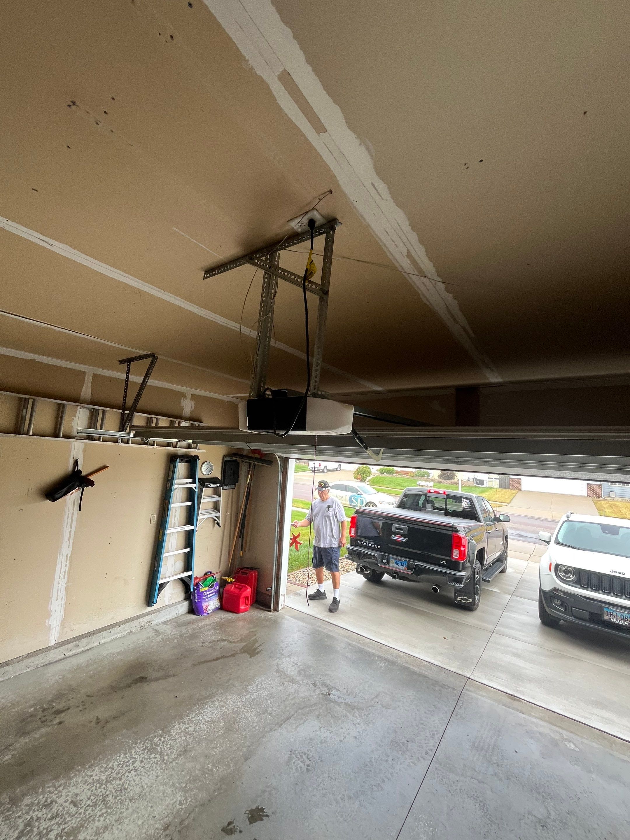 Nightfall Grey Speckled Epoxy Garage Floor Coating in Sioux Falls by Select Painting, Coatings & Garage Cabinets