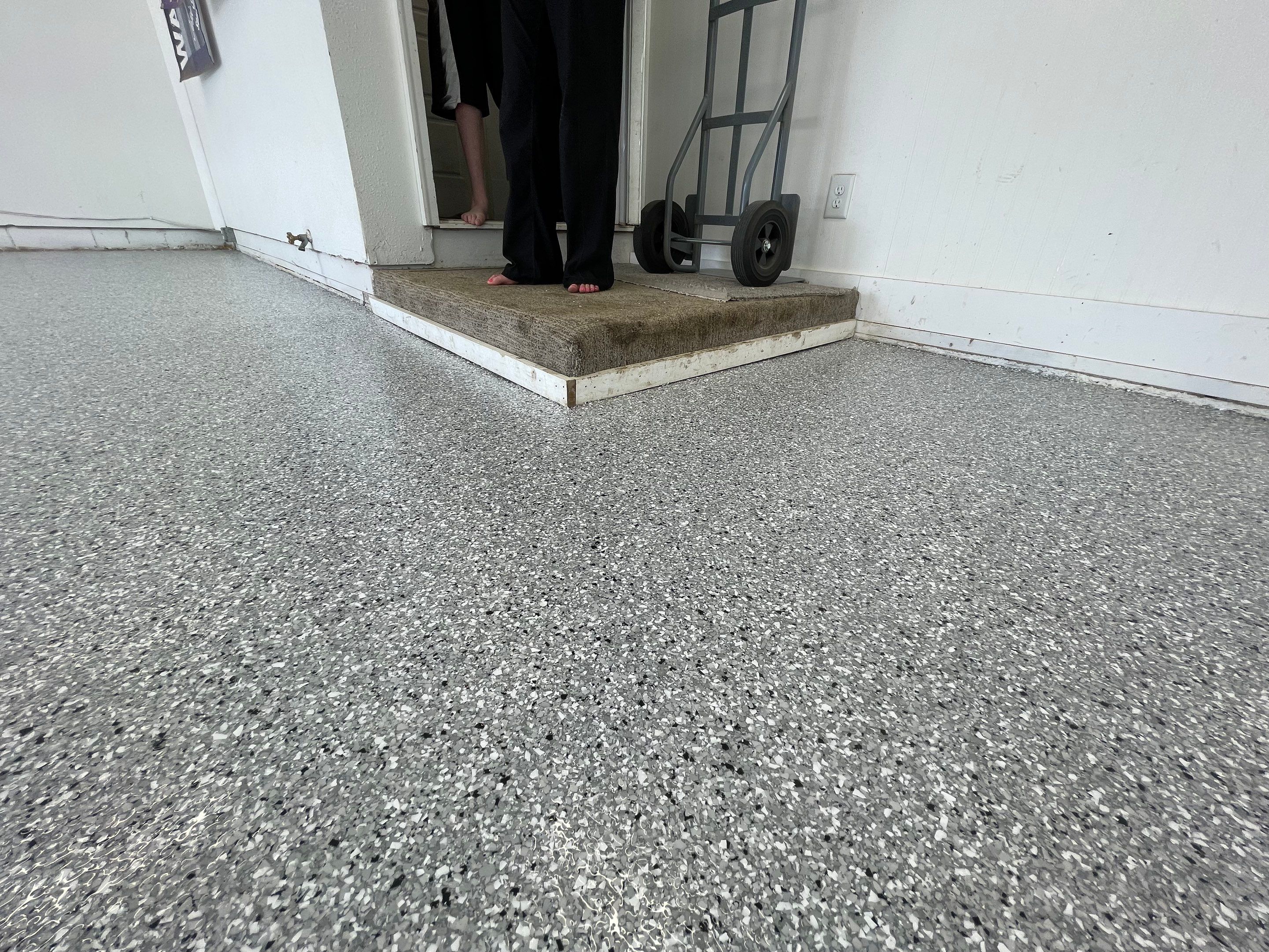 Feather Grey Garage Floor Coating and Crack Repair in Beresford by Select Painting, Coatings & Garage Cabinets