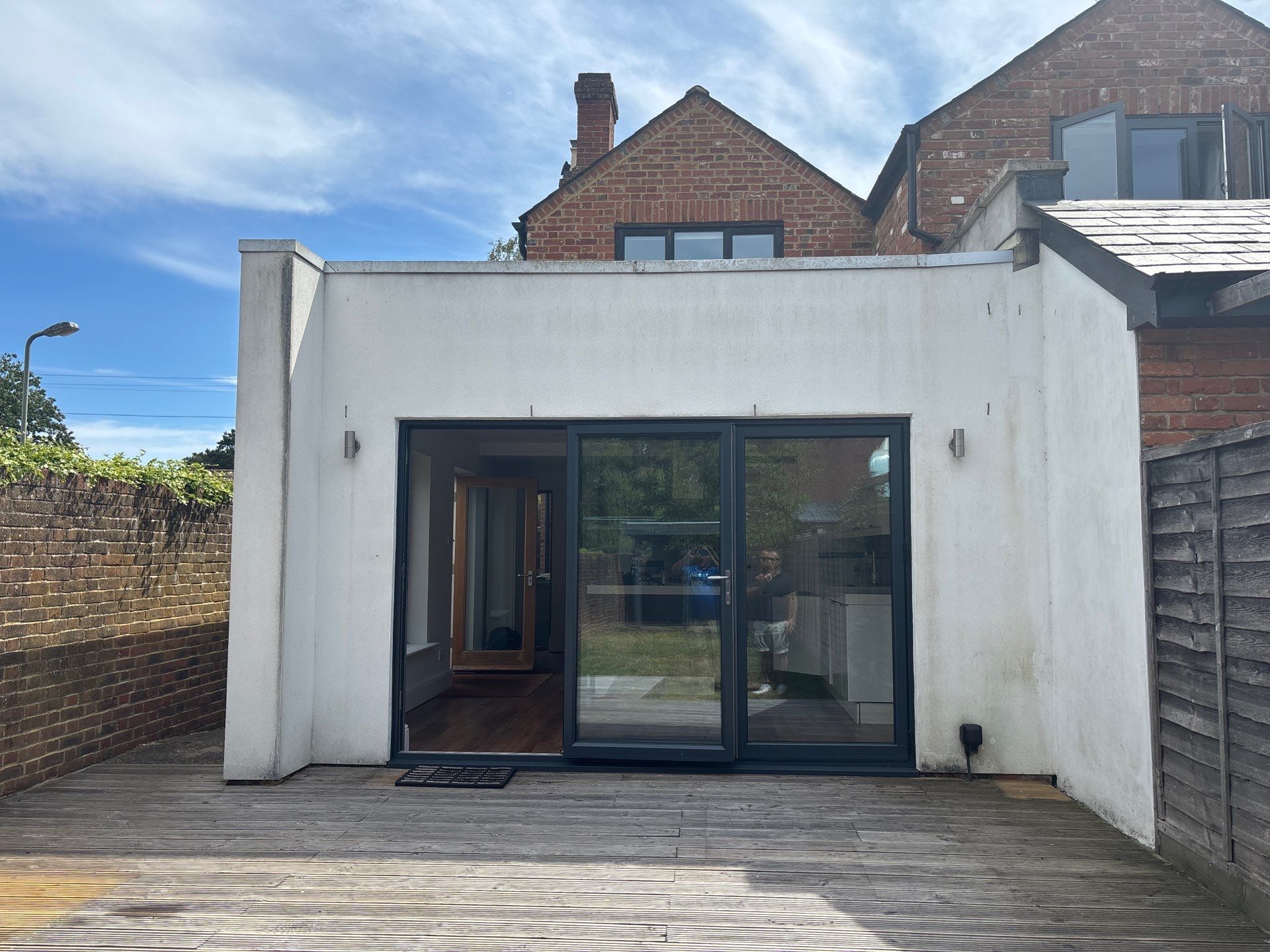 Timber Deck Restoration and Render Cleaning in Send, Surrey