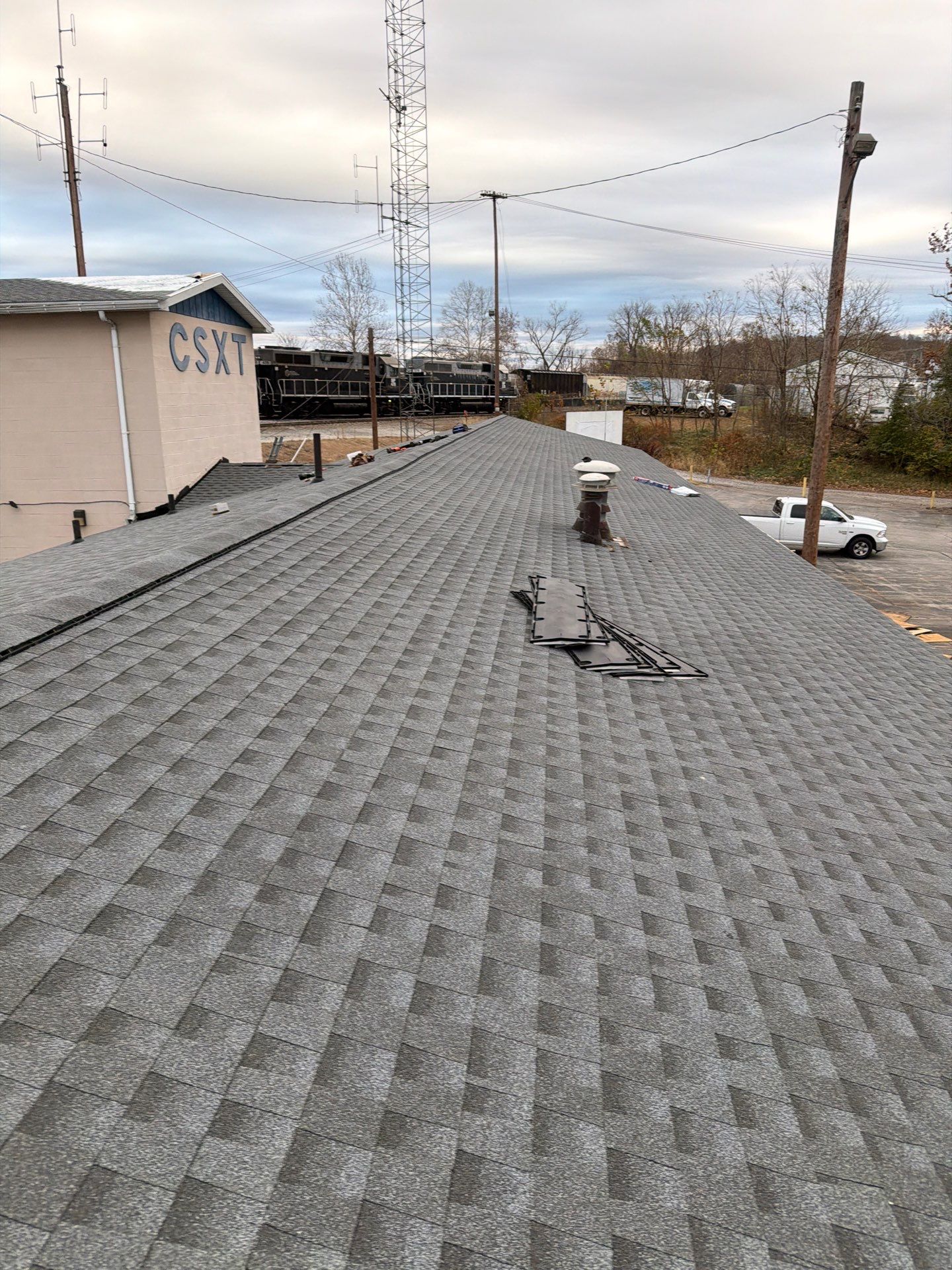 Commercial Roofing Installation using GAF Timberline HDZ Pewter Gray by Rainstoppers Roofing