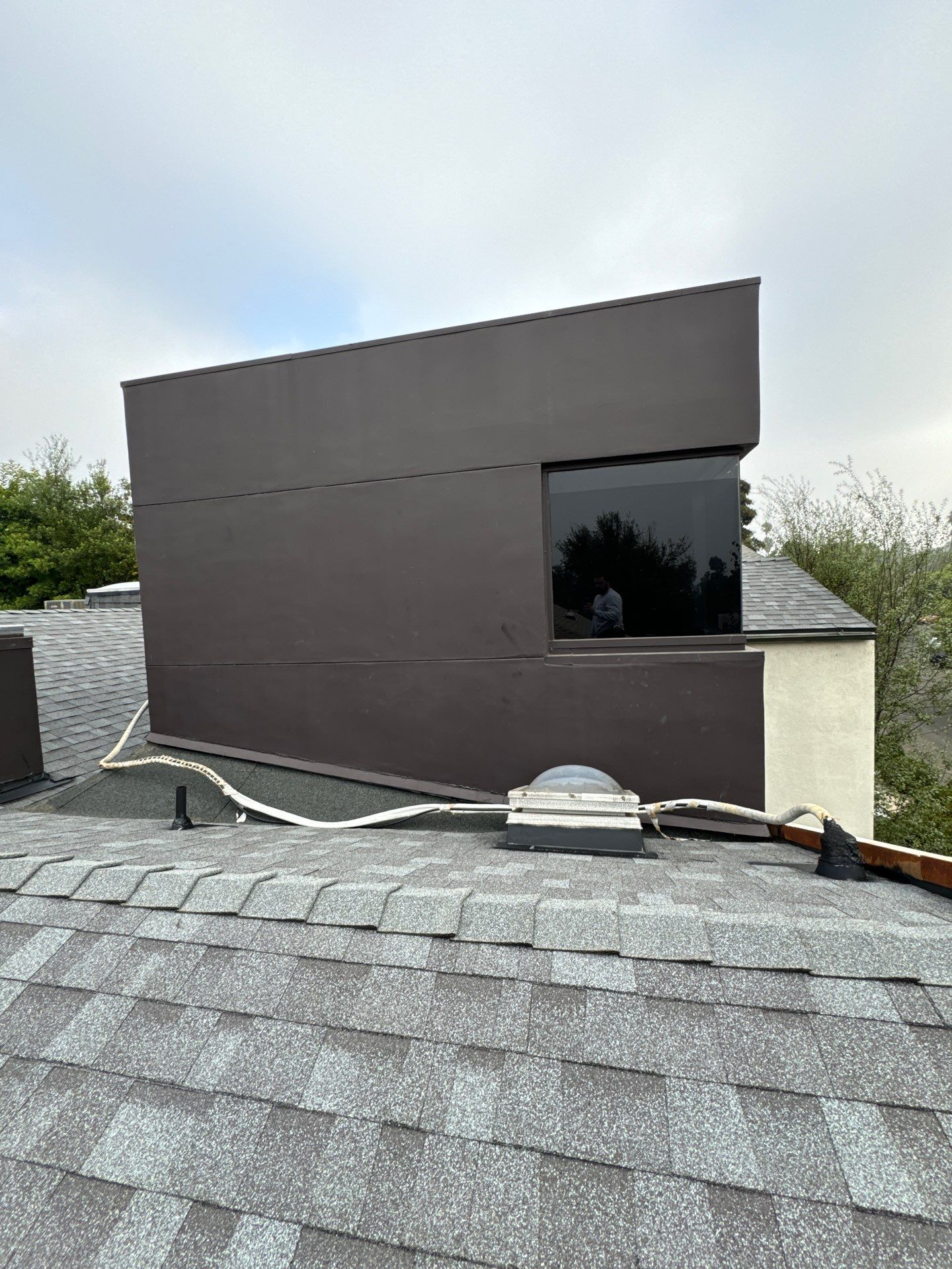 Residential Roofing Installation using Shingles and Silicone by Hull Brothers Roofing