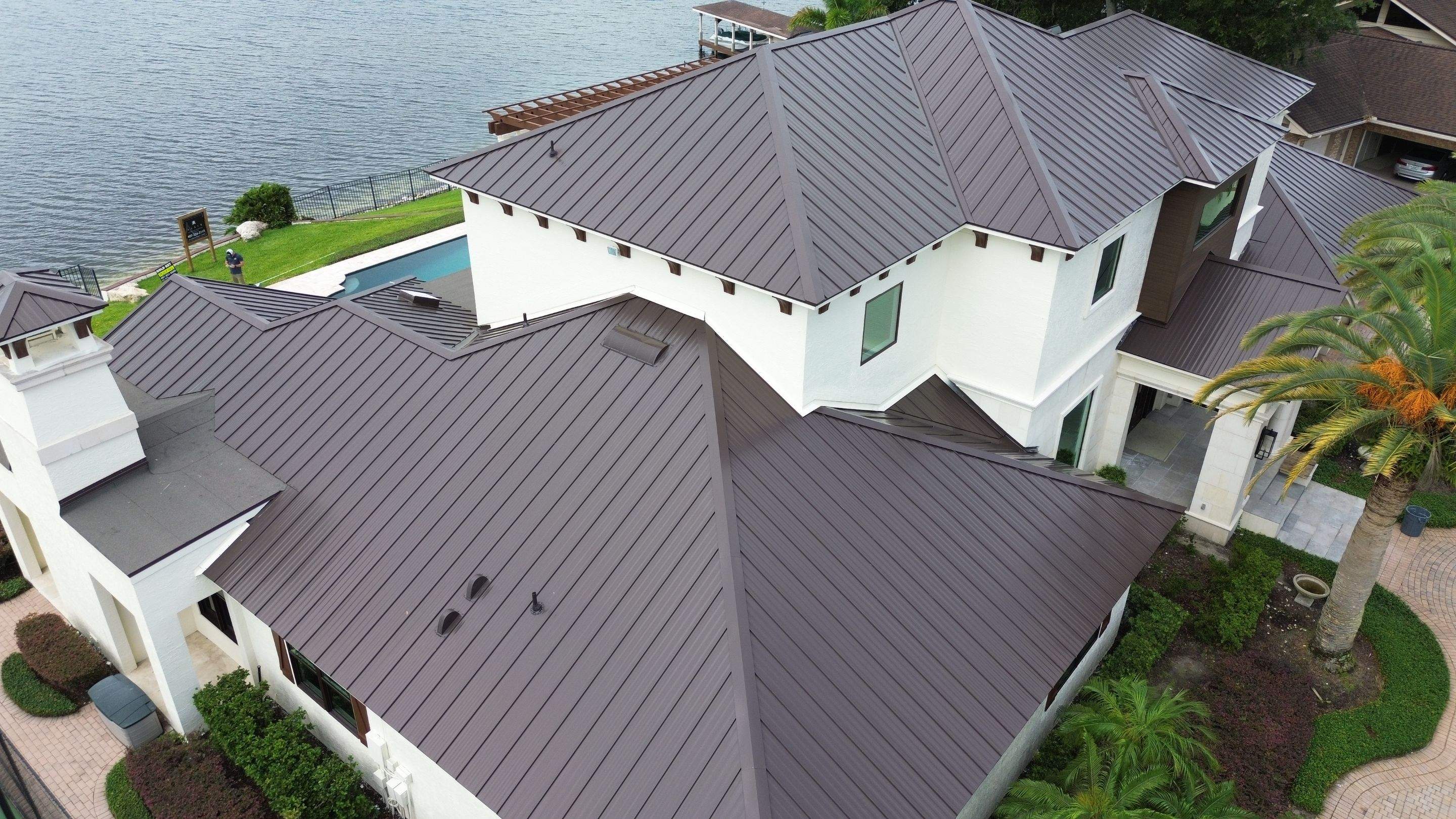 Standing seam metal roof on Lake Conway FL by Gold Key Roofing