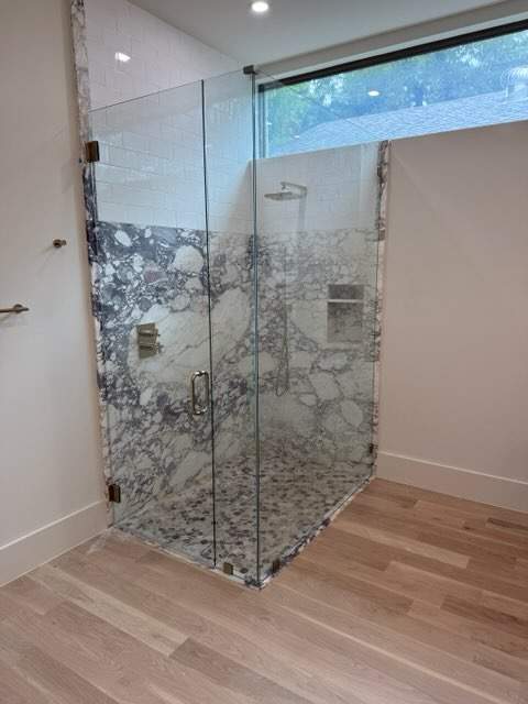Multiple Frameless Shower Installs by Richardson Glass & Mirror