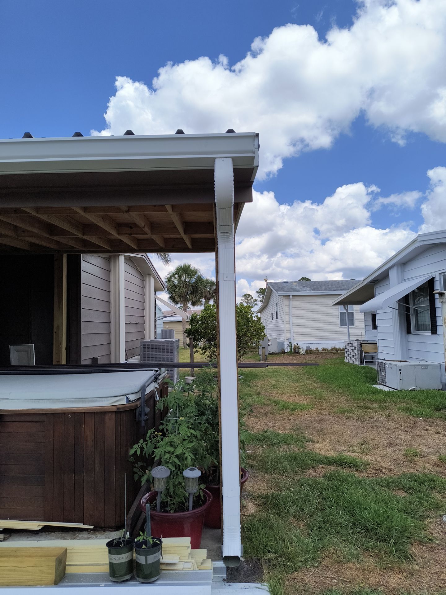 6 Inch Seamless Gutters using 3X4 Elbow Downspout in Venice FL by Gutter Professors