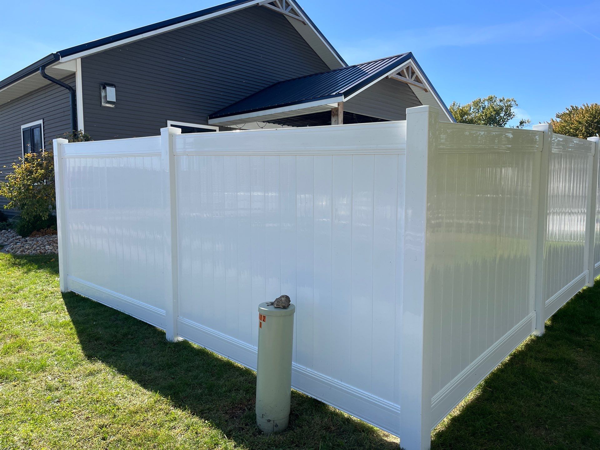 White Vinyl Privacy Fence Installation in Grundy Center by Perfect Picket Fence and Stain